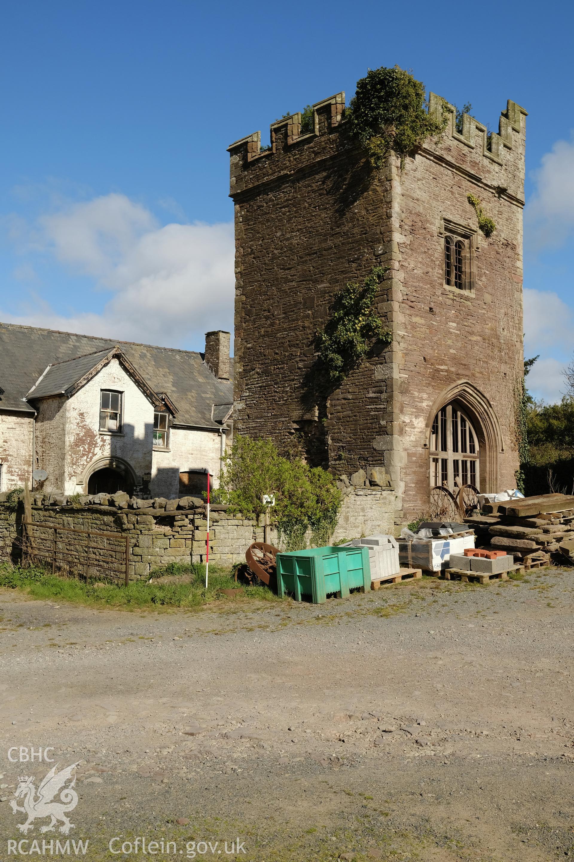 Colour photograph showing Great Porthmel Gatehouse - SW front and garden wall looking NW. Produced as part of Historic Building Recording for Great Porthamel Gatehouse, carried out by Richard Hayman, April 2021.