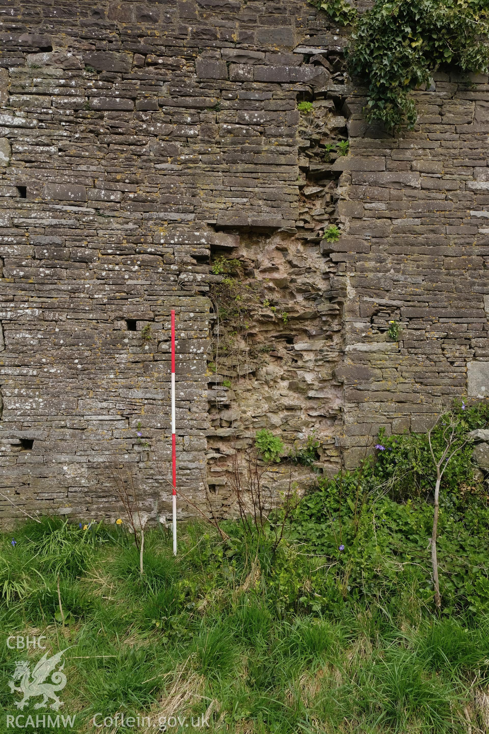 Colour photograph showing Great Porthmel Gatehouse - scar of former forecourt wall and parapet in SW front. Produced as part of Historic Building Recording for Great Porthamel Gatehouse, carried out by Richard Hayman, April 2021.