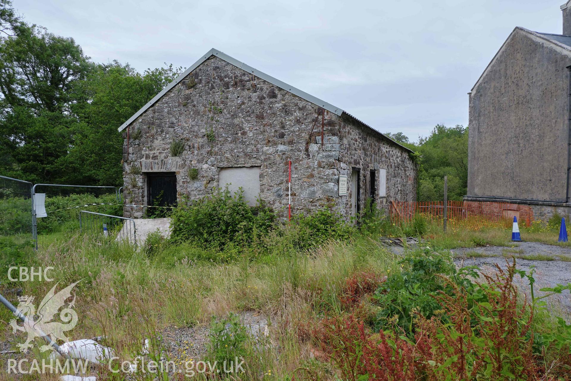 Colour photograph showing Blackpool Mill - store, S gable end looking N. Produced as part of Historic Building Recording for Blackpool Mill, carried out by Richard Hayman, June 2021.