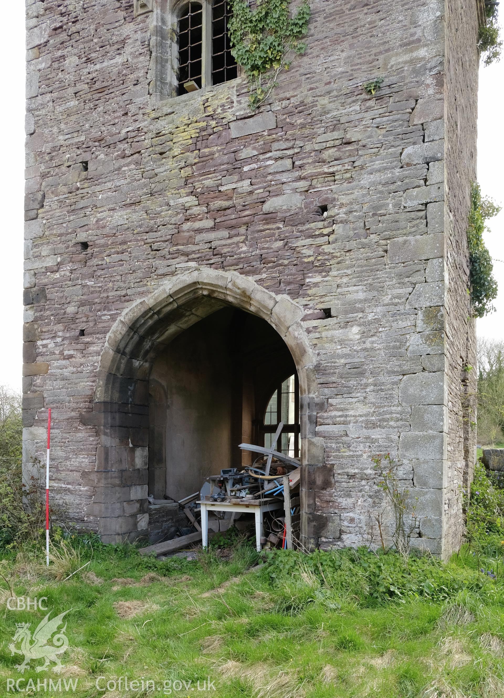 Colour photograph showing Great Porthmel Gatehouse - arch in NW front, looking E. Produced as part of Historic Building Recording for Great Porthamel Gatehouse, carried out by Richard Hayman, April 2021.