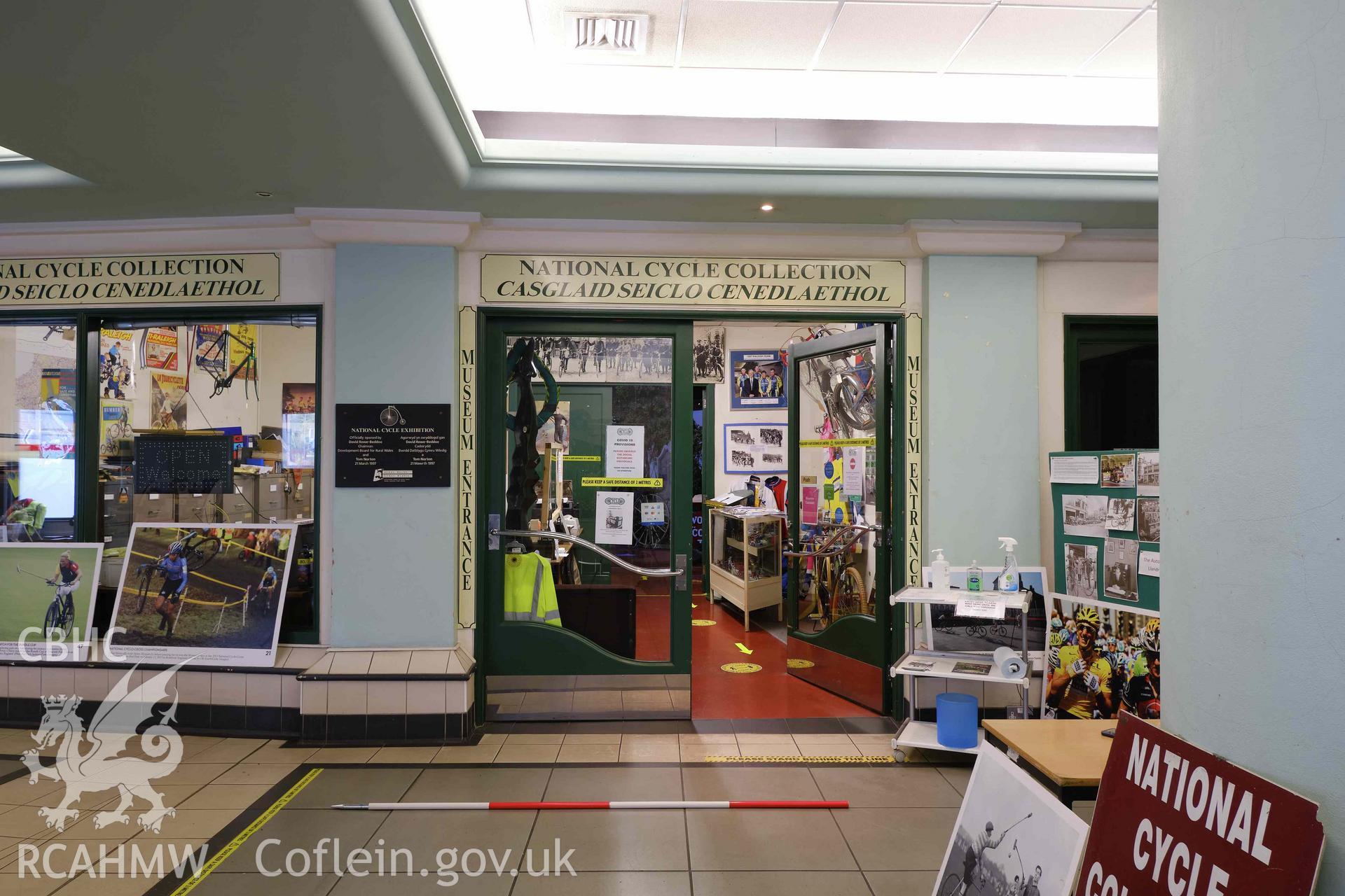 Colour photograph showing Automobile Palace - room G.3 to G.6, looking E. and National Cycle Collection exhibits. Produced as part of Historic Building Recording for Automobile Palace, carried out by Richard Hayman, June 2021.