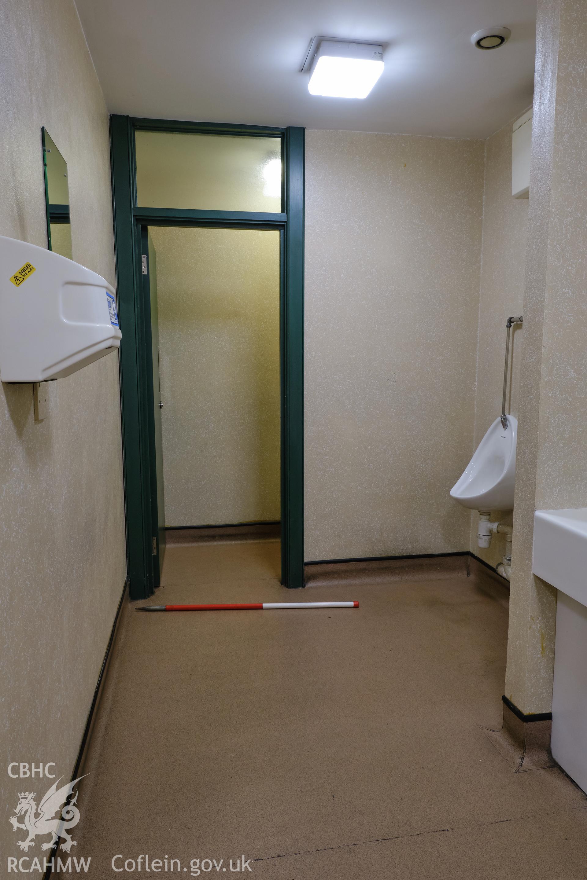 Colour photograph showing Automobile Palace - room G.11 (gents toilets), looking NE. Produced as part of Historic Building Recording for Automobile Palace, carried out by Richard Hayman, June 2021.