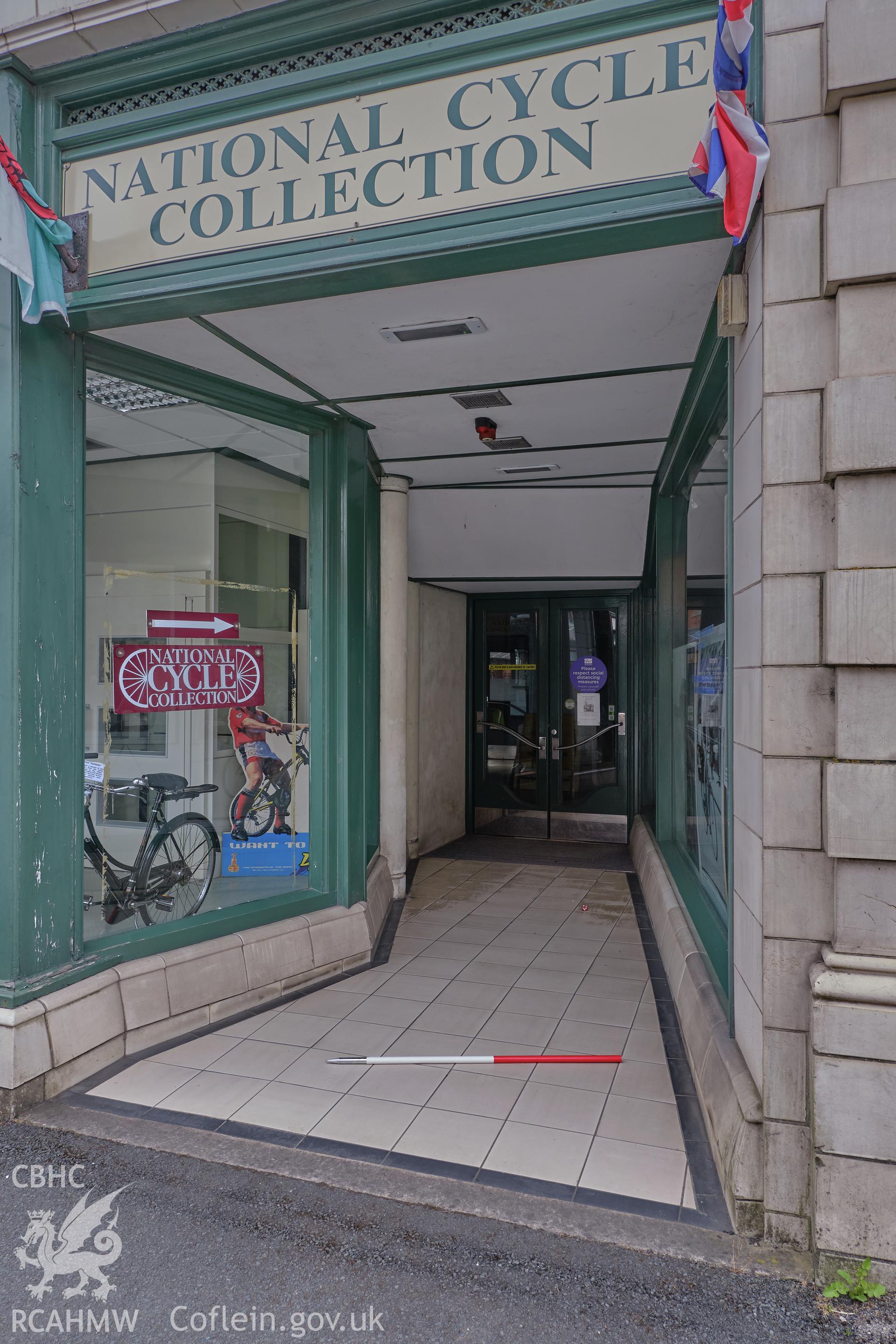 Colour photograph showing Automobile Palace - bay 8 entrance, Temple Street, looking S. Produced as part of Historic Building Recording for Automobile Palace, carried out by Richard Hayman, June 2021.