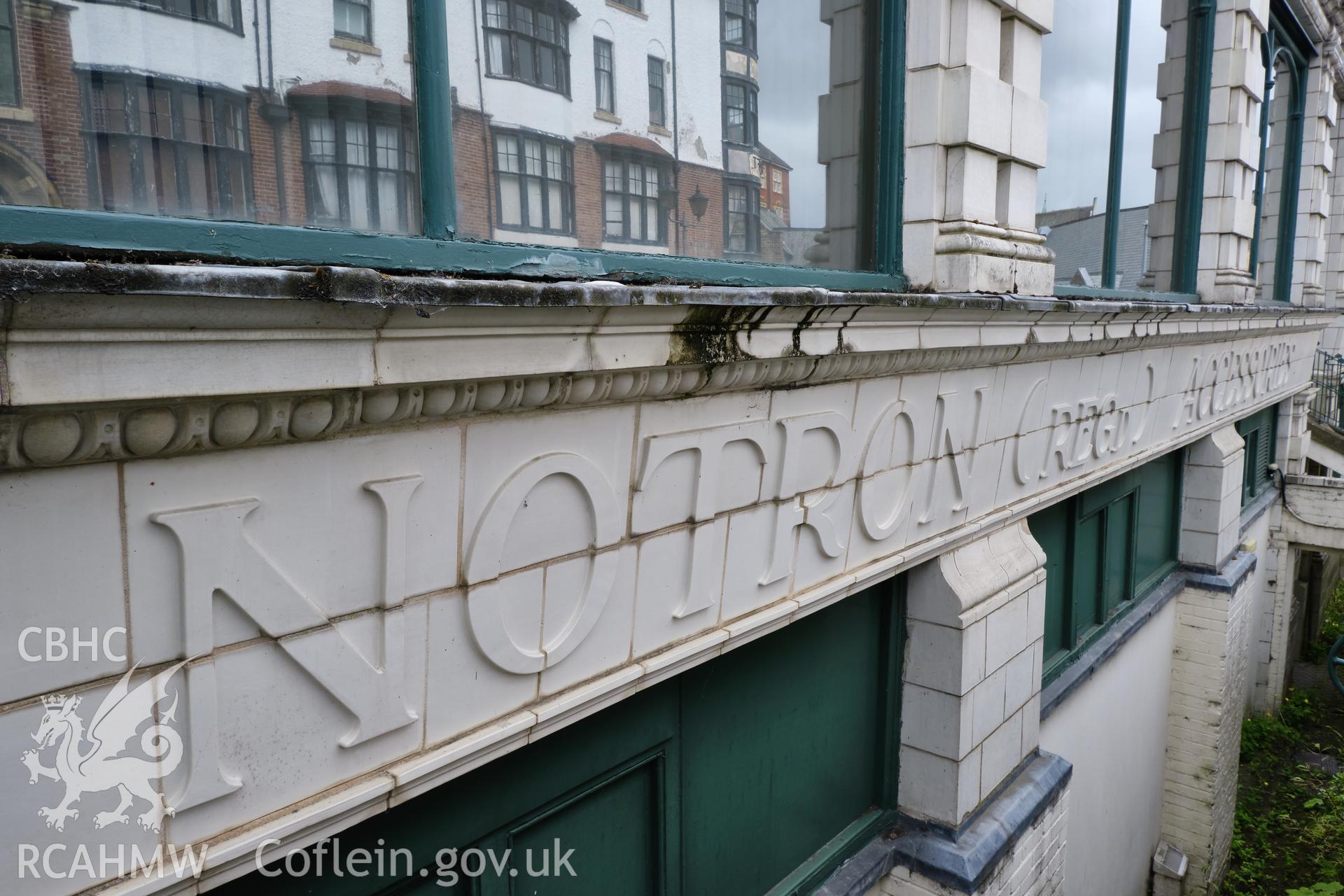 Colour photograph showing Automobile Palace - fascia detail, Princes Avenue front. Produced as part of Historic Building Recording for Automobile Palace, carried out by Richard Hayman, June 2021.