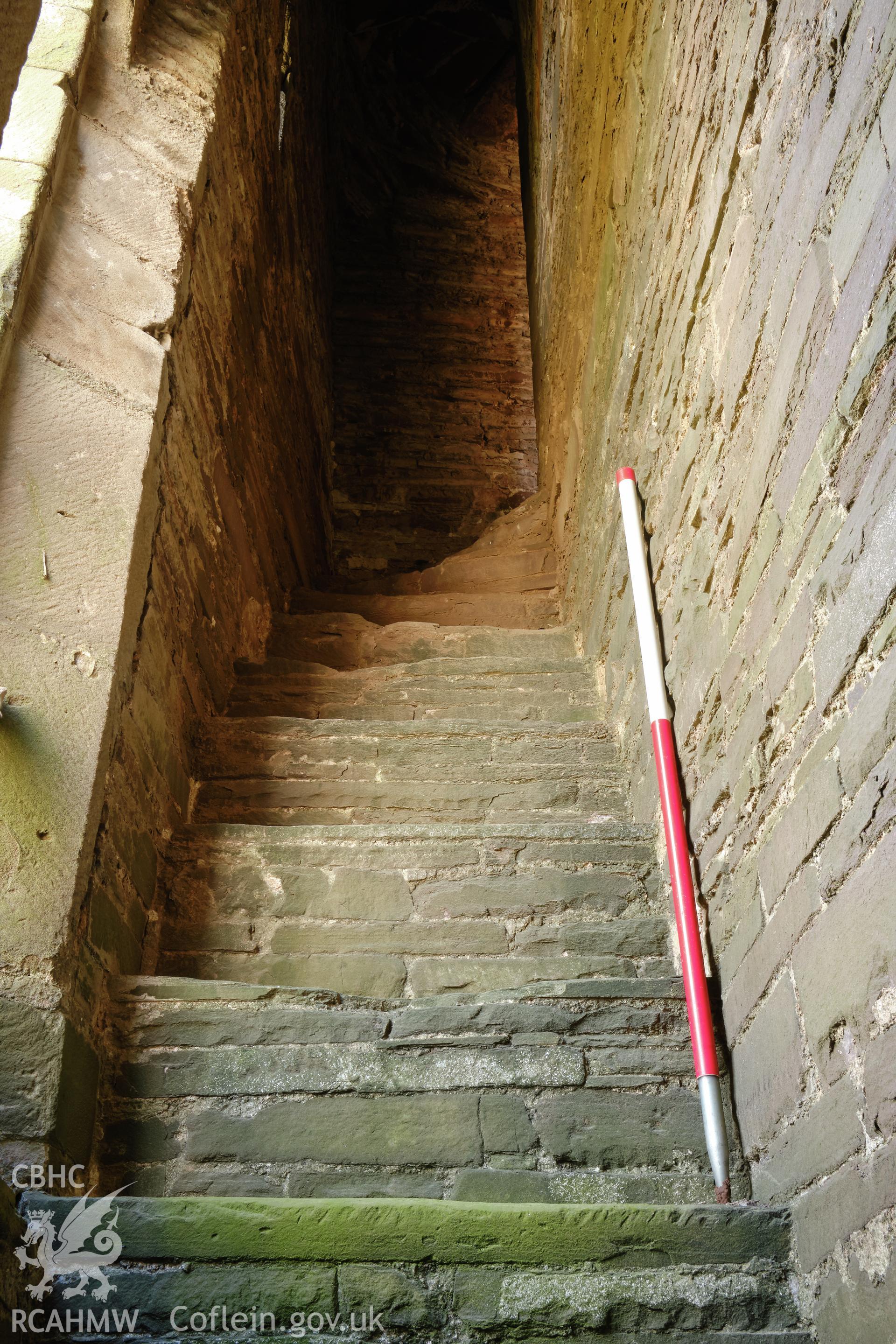 Colour photograph showing Great Porthmel Gatehouse - stair to upper stage, looking SE. Produced as part of Historic Building Recording for Great Porthamel Gatehouse, carried out by Richard Hayman, April 2021.
