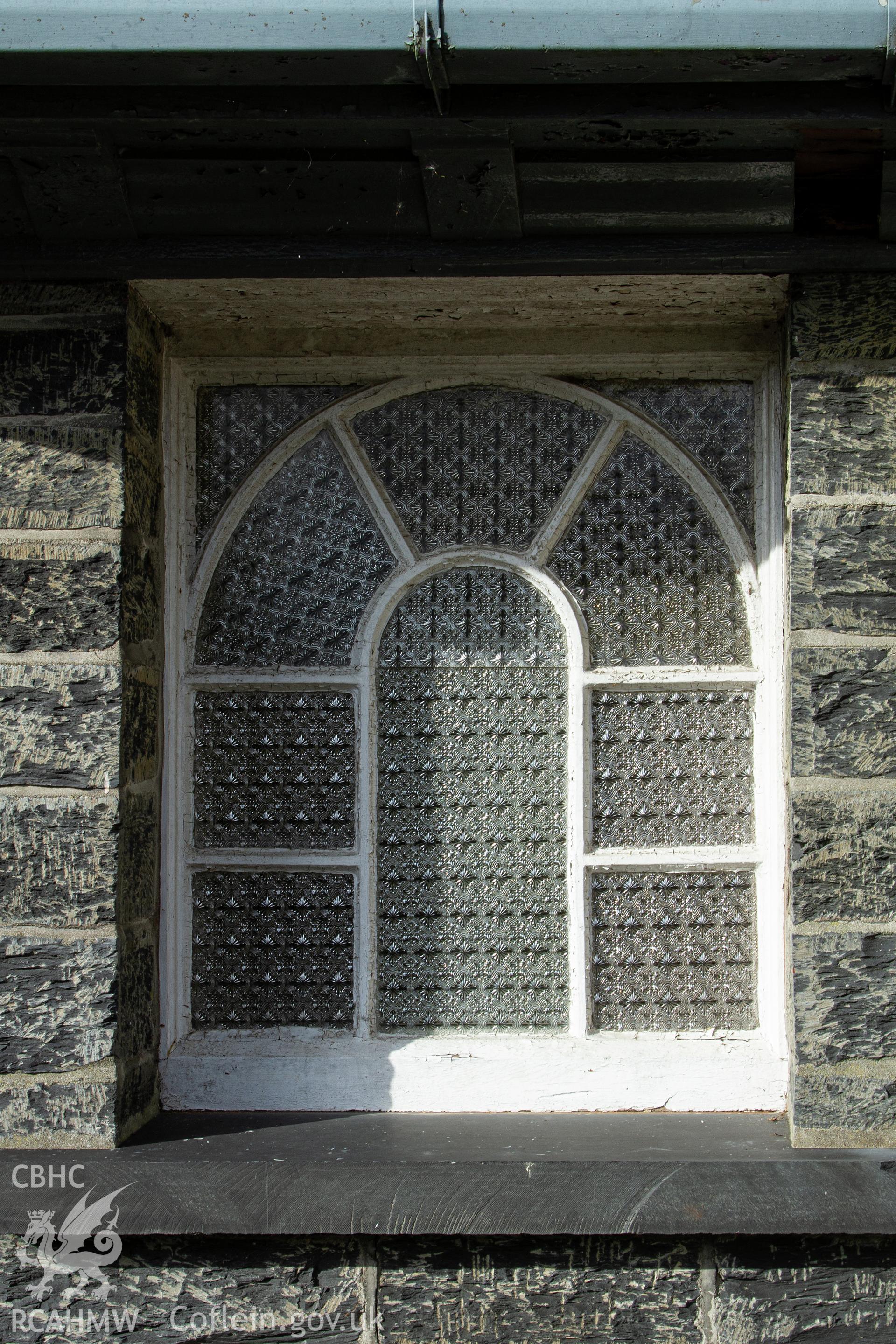 Colour photograph of small front window - part of a photographic survey of Bethania Chapel, Aberangell, Gwynedd, produced for John Linden by Adrian John Hexter as a condition of planning consent. (Planning Application Ref. No. NP5/74/L319). Snowdonia National Park Planning Authority.