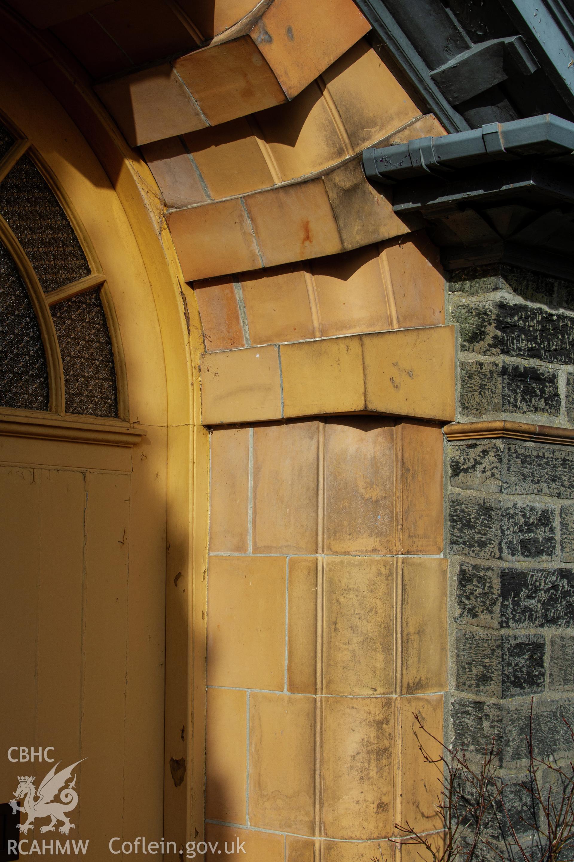 Colour photograph of detail of brickwork arch around front doors  - part of a photographic survey of Bethania Chapel, Aberangell, Gwynedd, produced for John Linden by Adrian John Hexter as a condition of planning consent. (Planning Application Ref. No. NP5/74/L319). Snowdonia National Park Planning Authority.