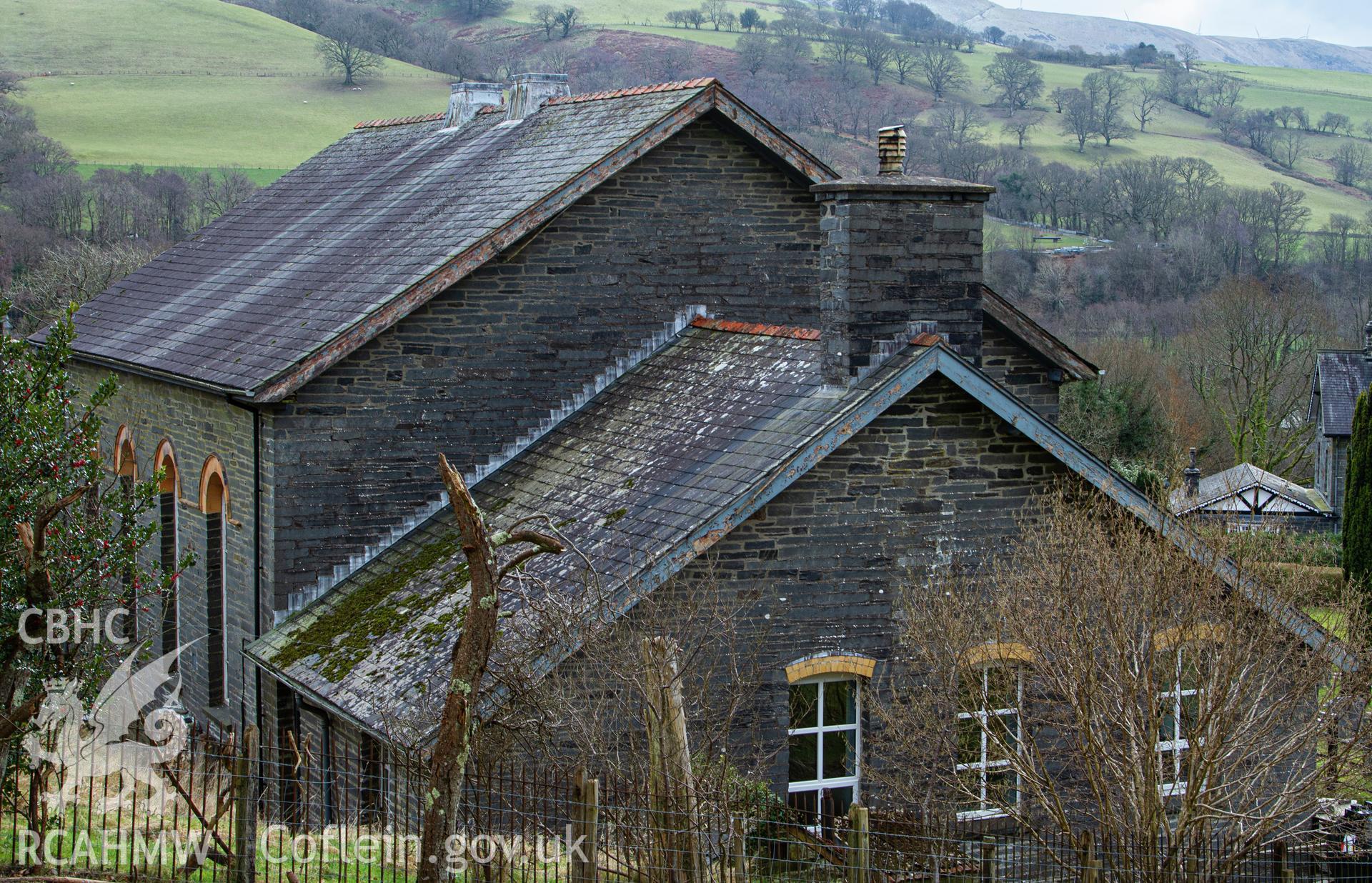 Colour photograph of vestry/chapel from west - part of a photographic survey of Bethania Chapel, Aberangell, Gwynedd, produced for John Linden by Adrian John Hexter, as a condition of planning consent. (Planning Application Ref. No. NP5/74/L319). Snowdonia National Park Planning Authority.