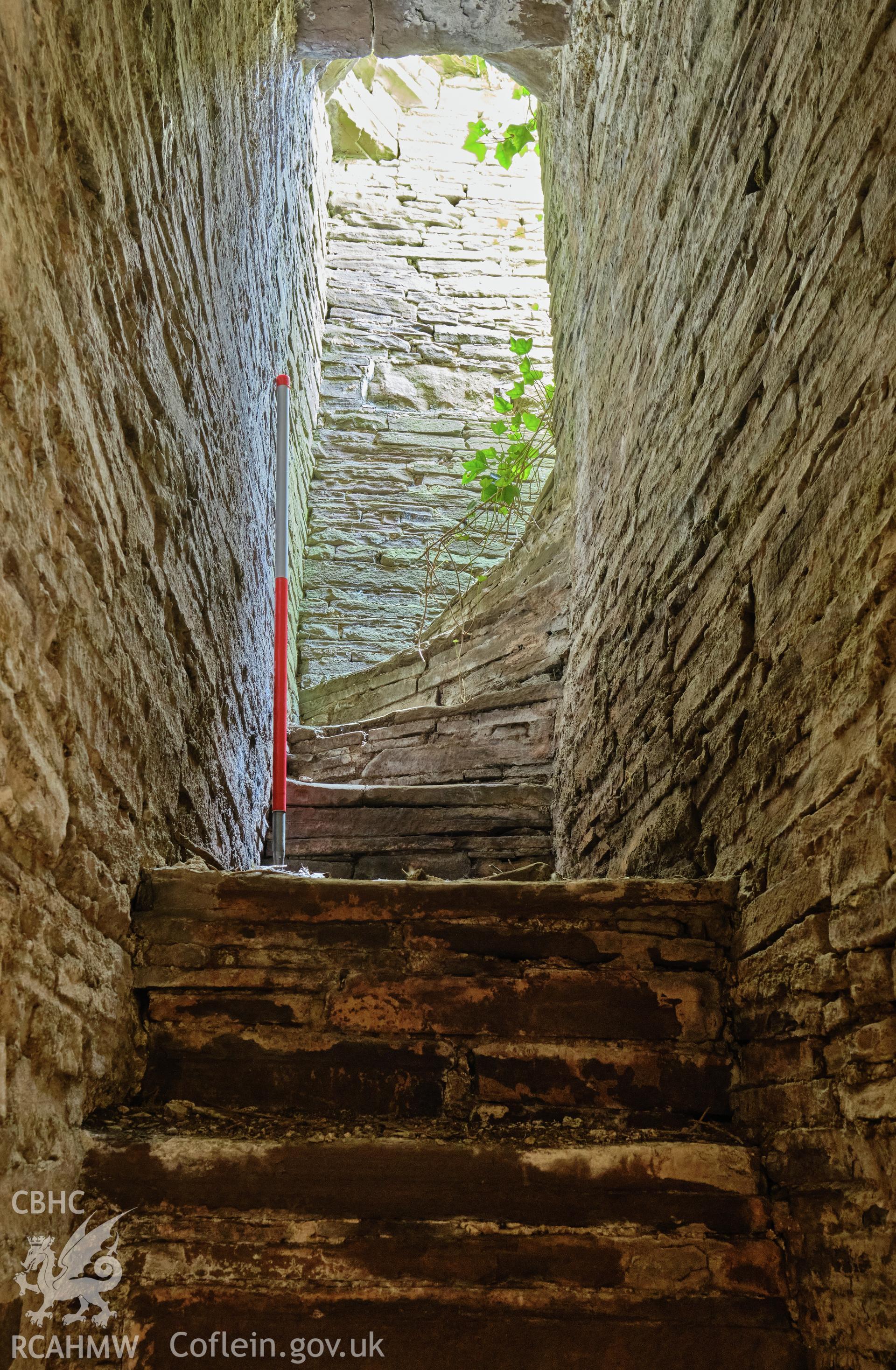Colour photograph showing Great Porthmel Gatehouse - stair to parapet, looking SE. Produced as part of Historic Building Recording for Great Porthamel Gatehouse, carried out by Richard Hayman, April 2021.
