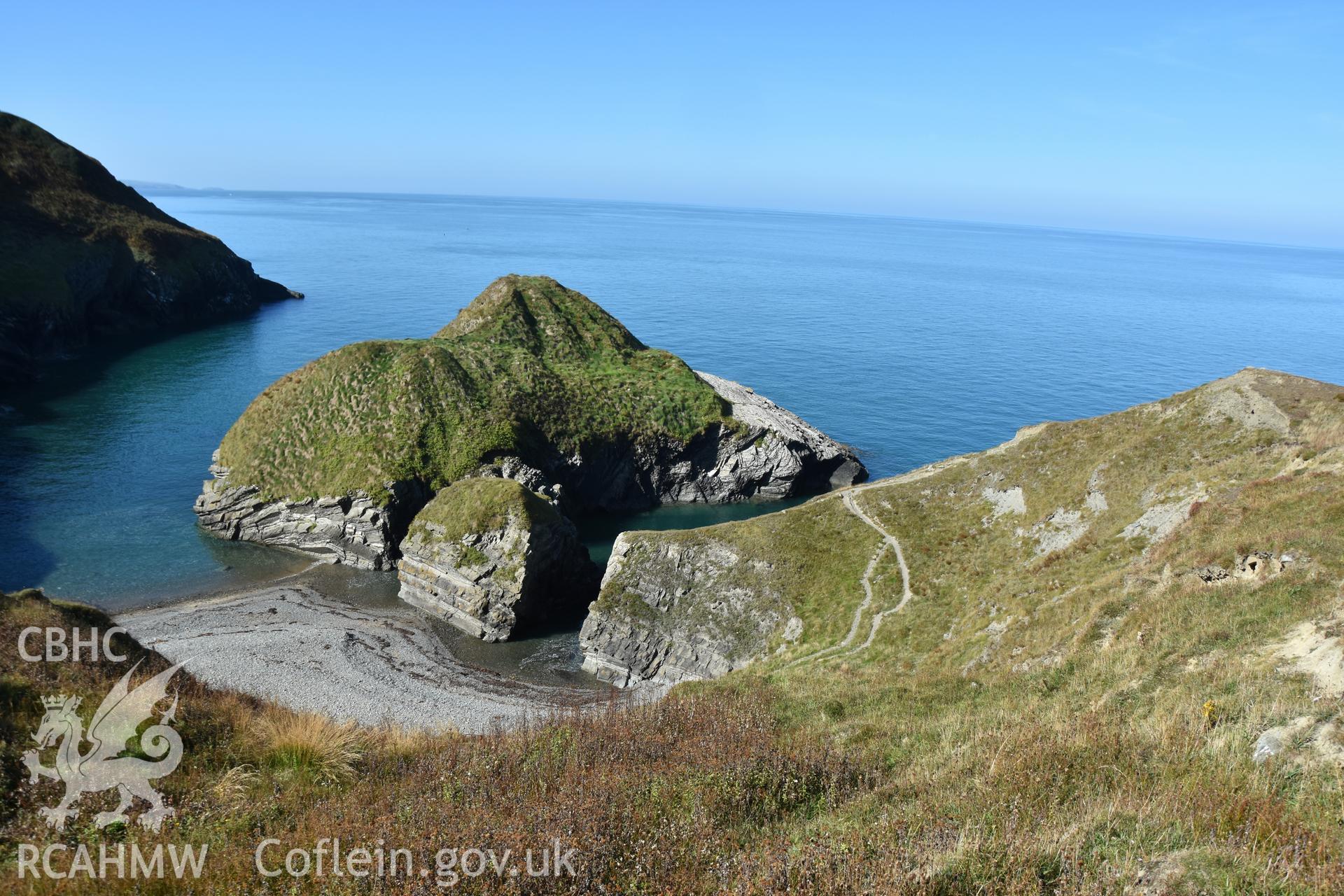 Islet and cliff edge. Camera facing NW. From photographic survey of Castell Bach (NPRN 93914) by Dr Toby Driver for site monitoring 19/09/2019.
Produced with EU funds through the Ireland Wales Co-operation Programme 2014-2020. All material made freely available through the Open Government Licence.