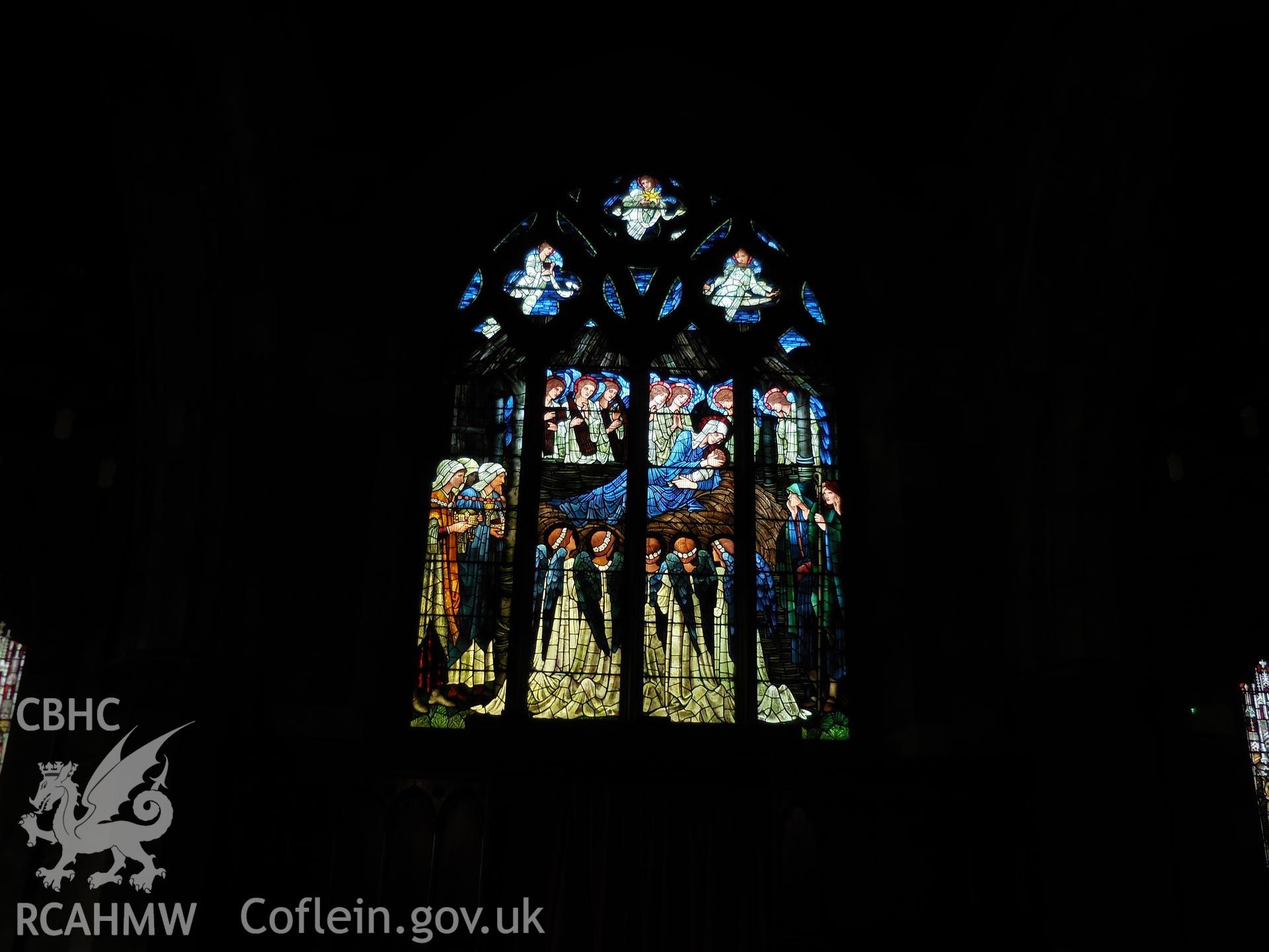 Colour digital photograph showing stained glass window in St Deiniol's church, Hawarden, taken in March 2022.