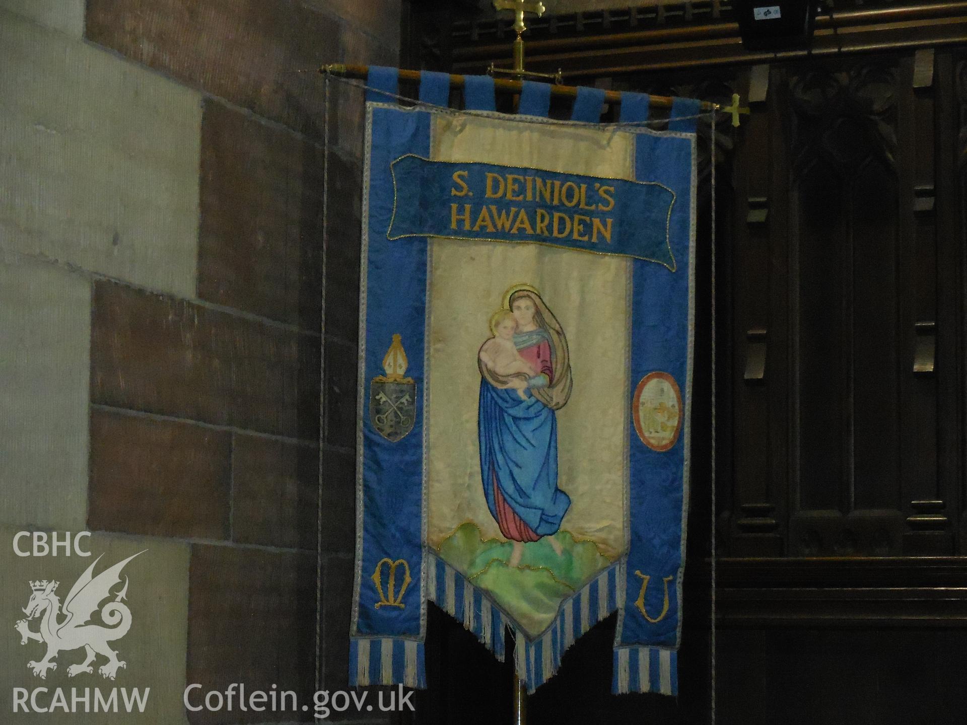 Colour digital photograph showing banner at St Deiniol's church, Hawarden, taken in March 2022.