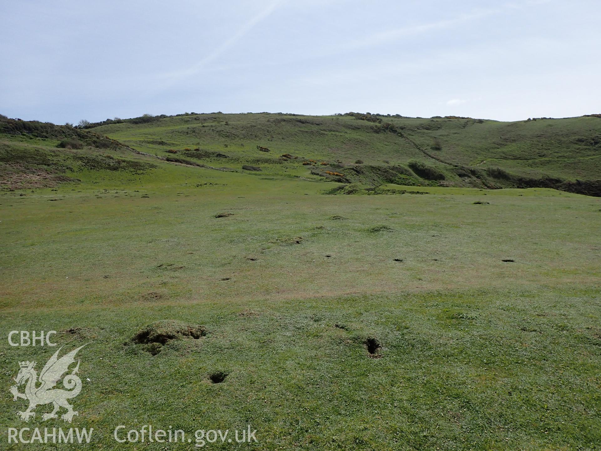 General shot of site facing S. From a photographic survey of Castell Bach promontory fort (NPRN 93914) by Daniel Hunt for CHERISH project condition monitoring 27/05/2021.
Produced with EU funds through the Ireland Wales Co-operation Programme 2014-2020. All material made freely available through the Open Government Licence.