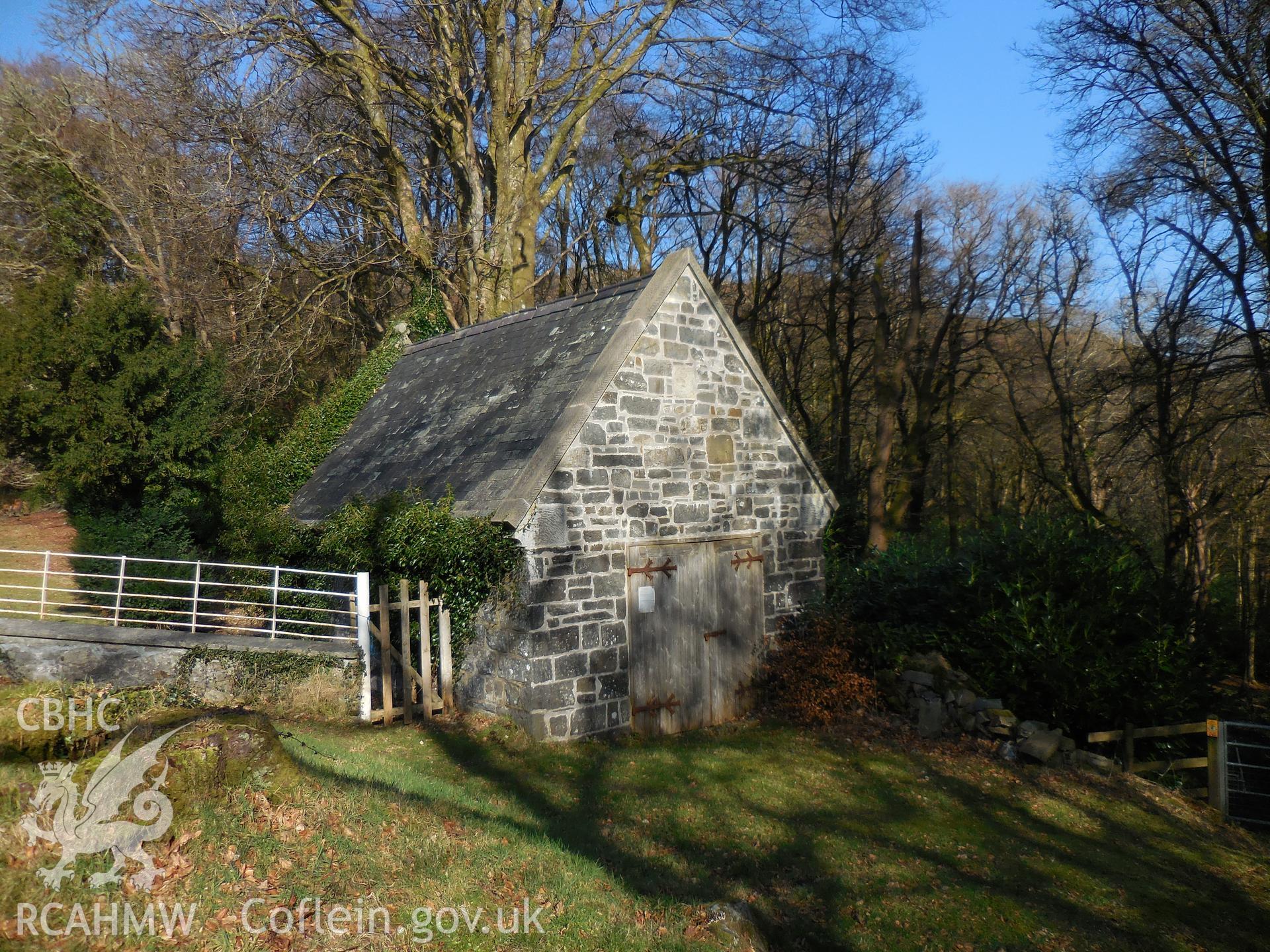 Colour digital photograph showing the hearse house at Llanwddyn church, taken in February 2022.