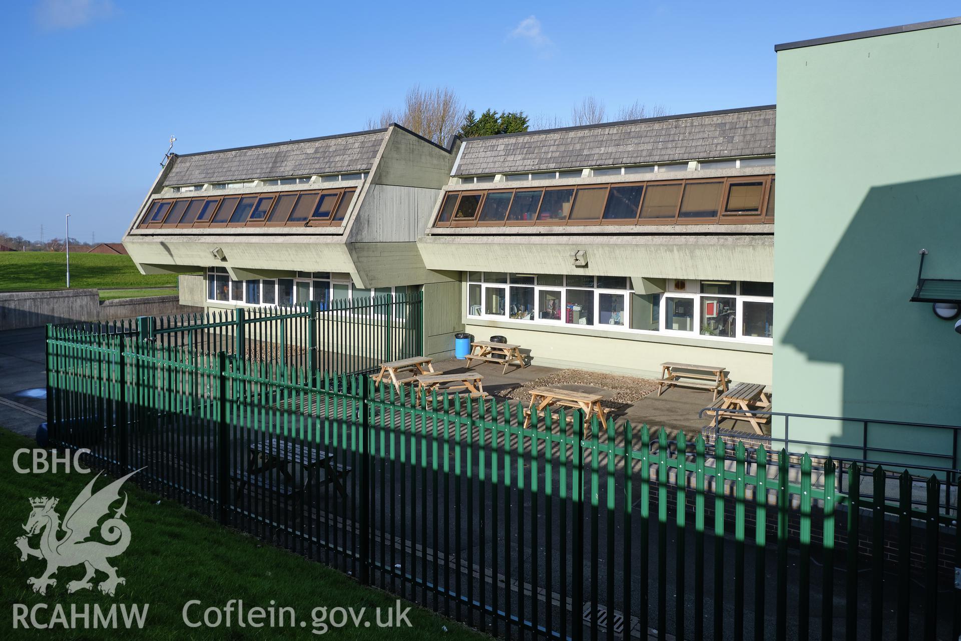 Colour photograph showing Argoed School - N classroom wing W front looking NE.