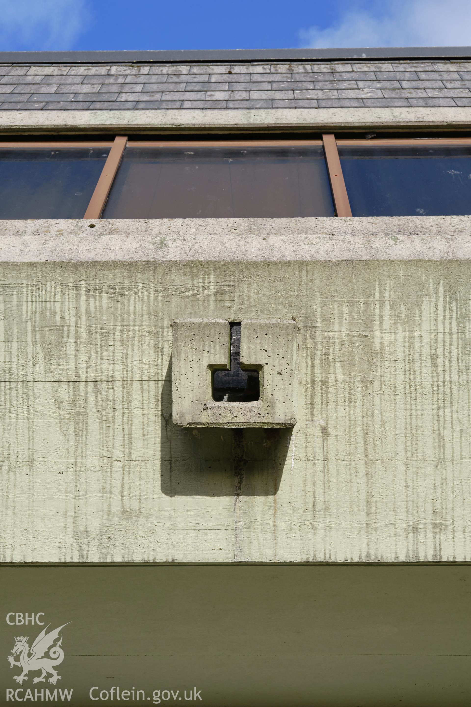 Colour photograph showing Argoed School - N classroom wing W front, rainwater spout.