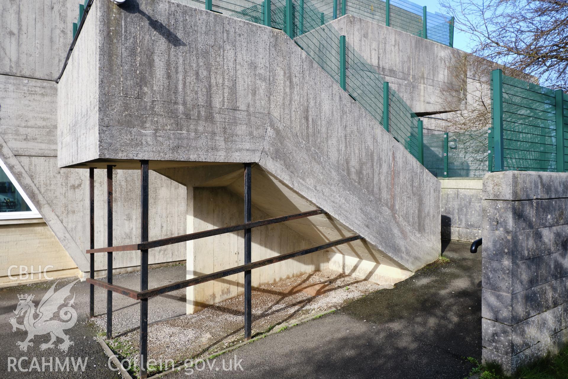Colour photograph showing Argoed School - courtyard, stair at S end of classroom wing looking NE.