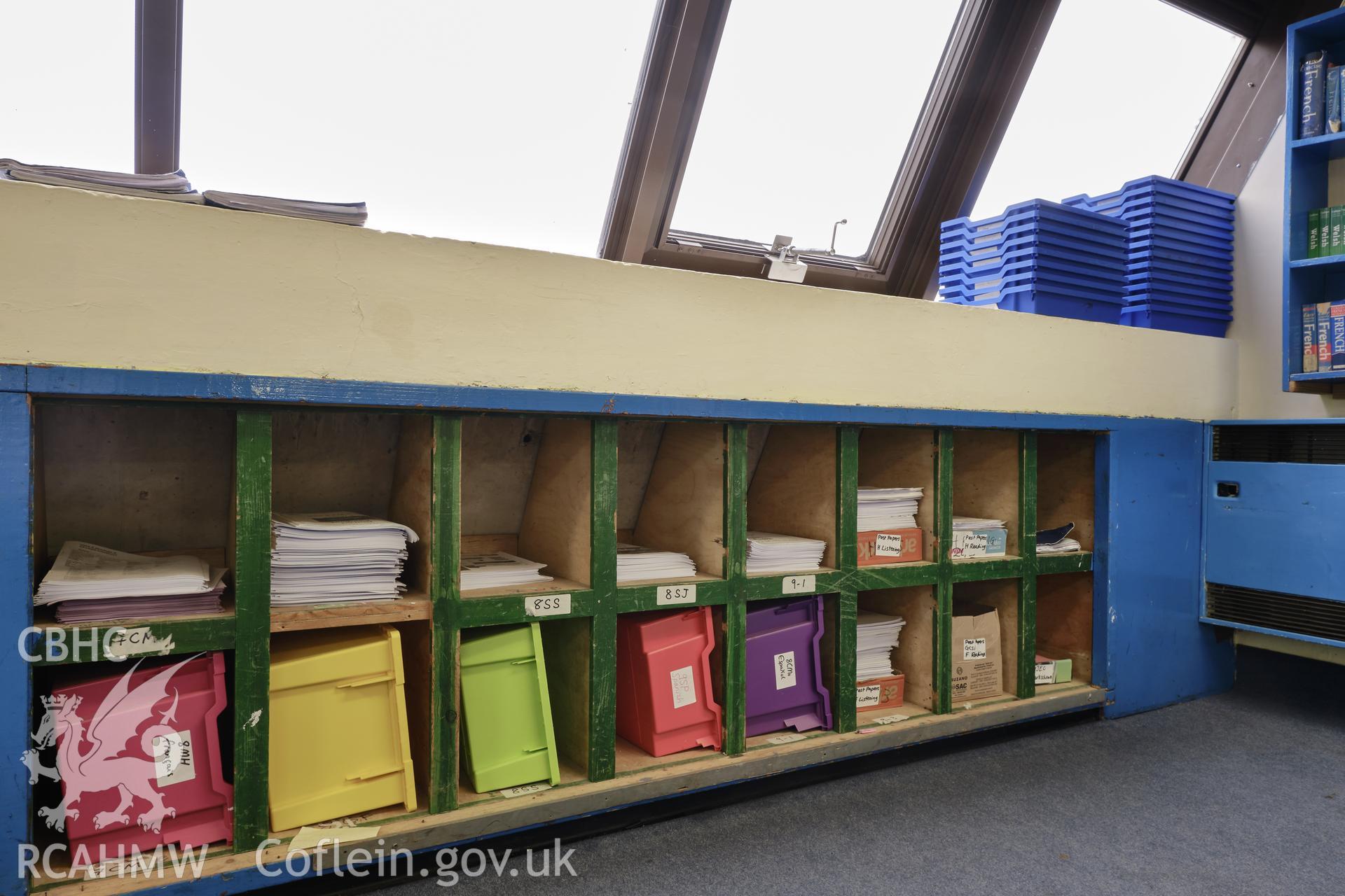 Colour photograph showing Argoed School - room 5, shelves below window sill.