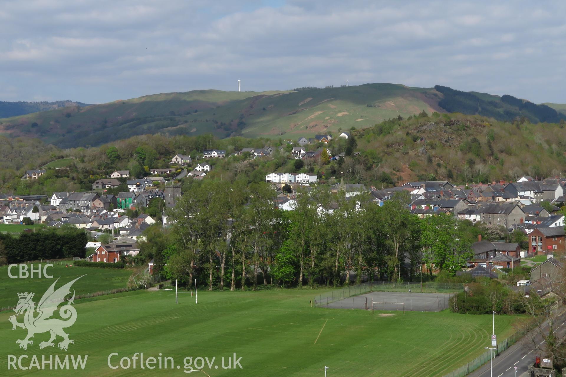 View of 1-6 Penrallt Estate, Machynlleth, from the south west showing the surrounding area, taken from Cae-Gybi Footpath on 27 April 2022.