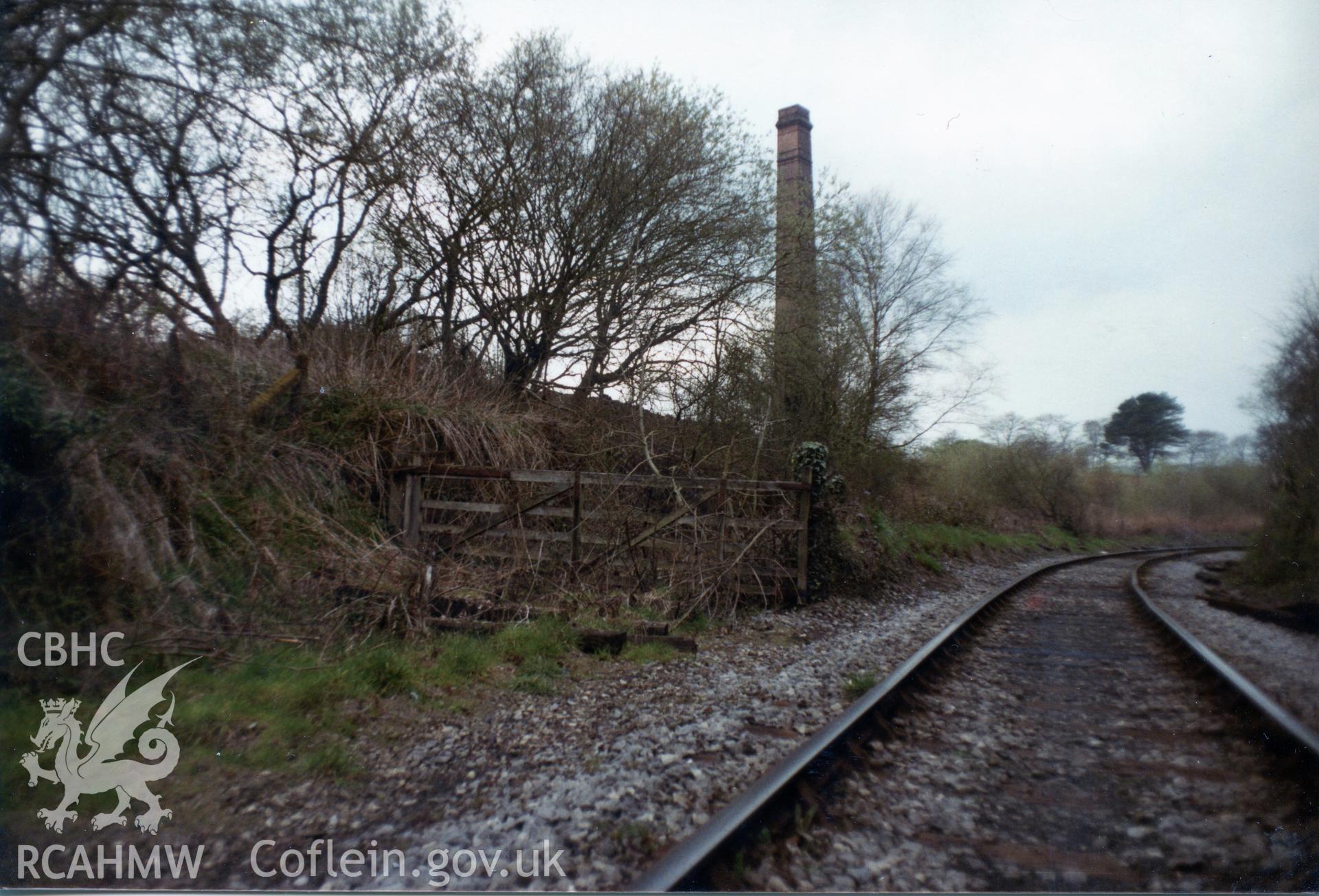 Digital photograph showing Horeb Brickworks chimney and Llanelli & Mynydd Mawr Railway line, dated July 1983.