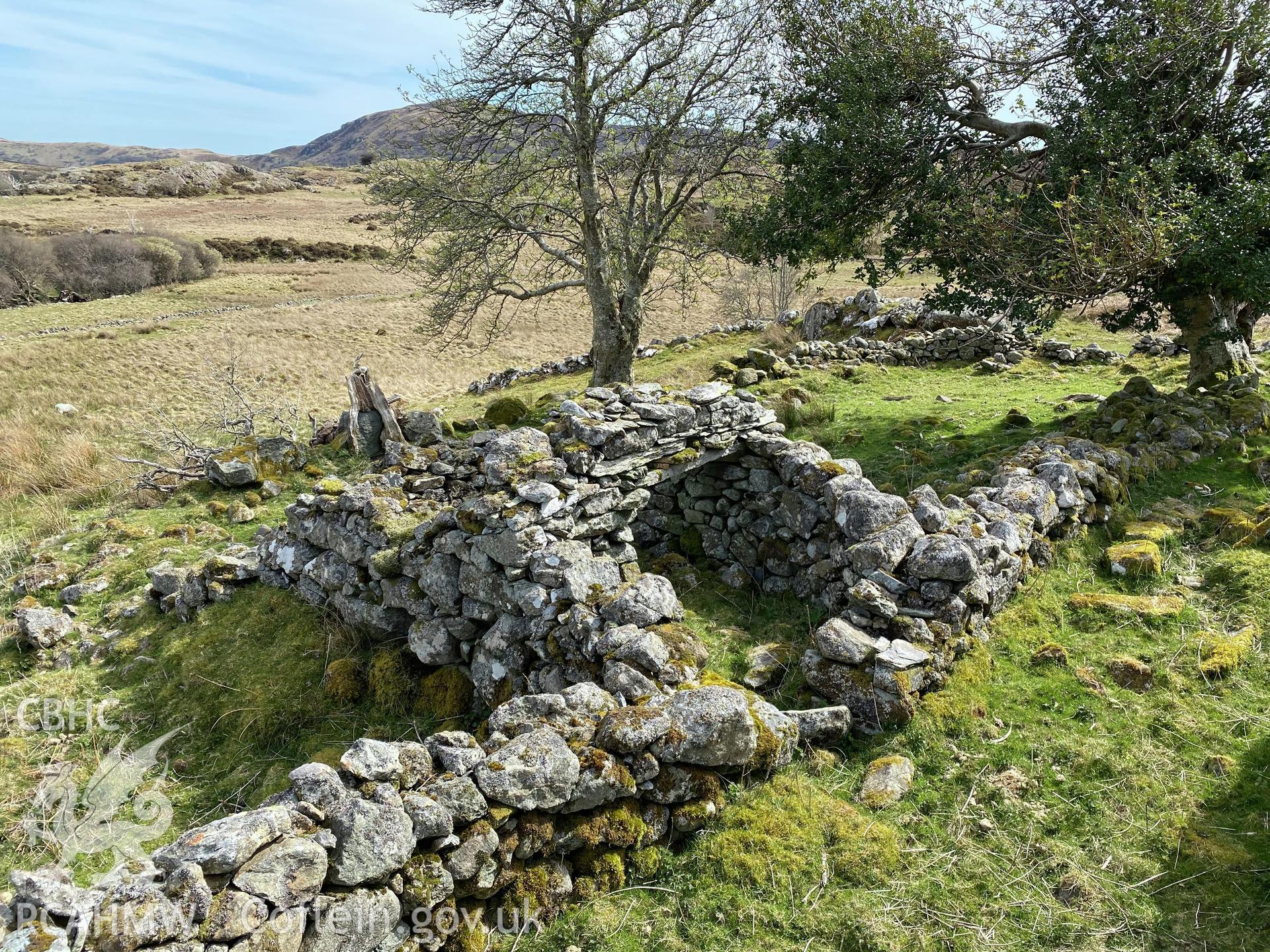 Digital colour photograph showing Maen Eira ruin, possible pigsty, produced by Paul R Davis in 2021.