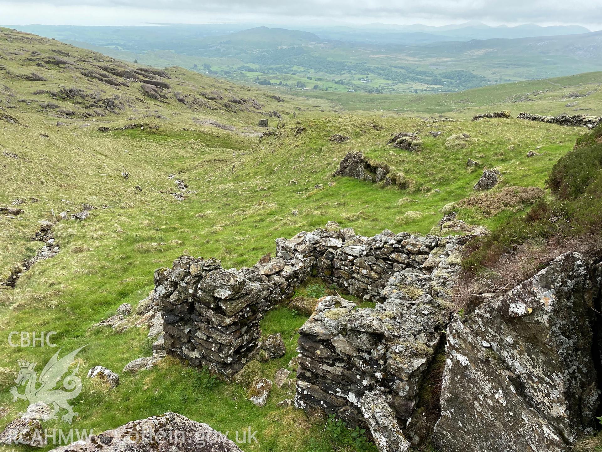 Digital colour photograph showing Moel Hebog mine buildings, produced by Paul R Davis in 2021.