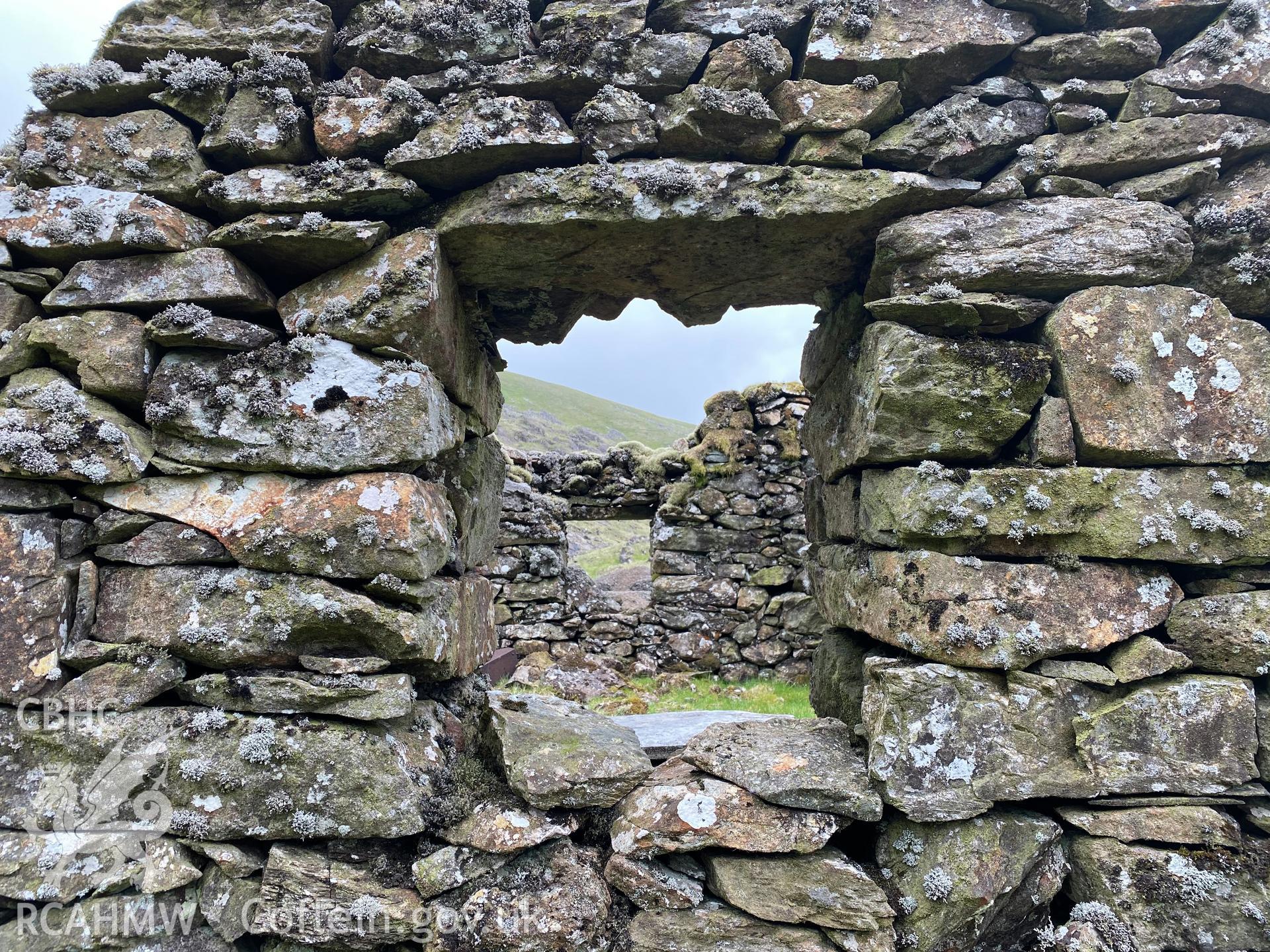 Digital colour photograph showing Moel Hebog mine buildings, produced by Paul R Davis in 2021.