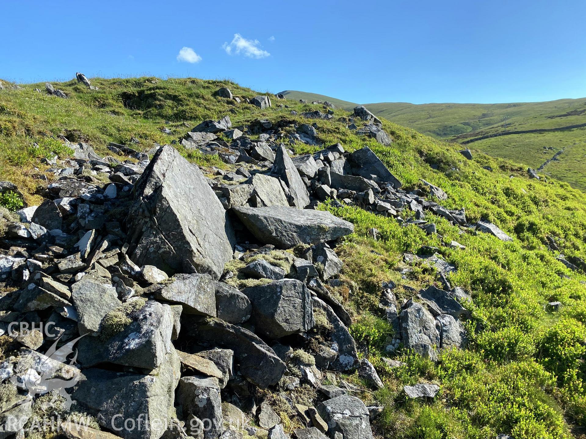 Digital colour photograph showing Dinas Ty-du hillfort (early walling on north side), produced by Paul R Davis in 2021.