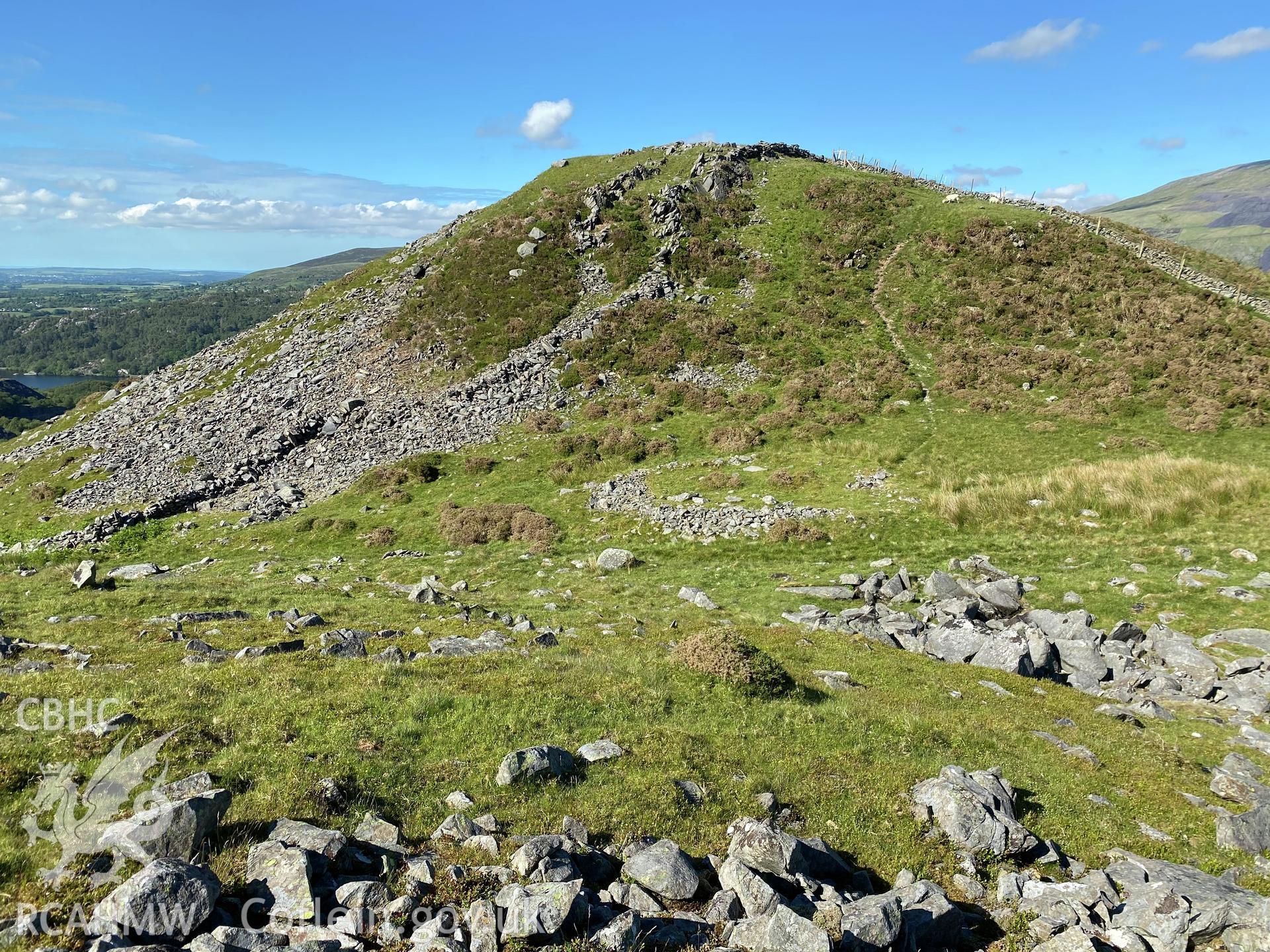 Digital colour photograph showing Dinas Ty-du hillfort, produced by Paul R Davis in 2021.