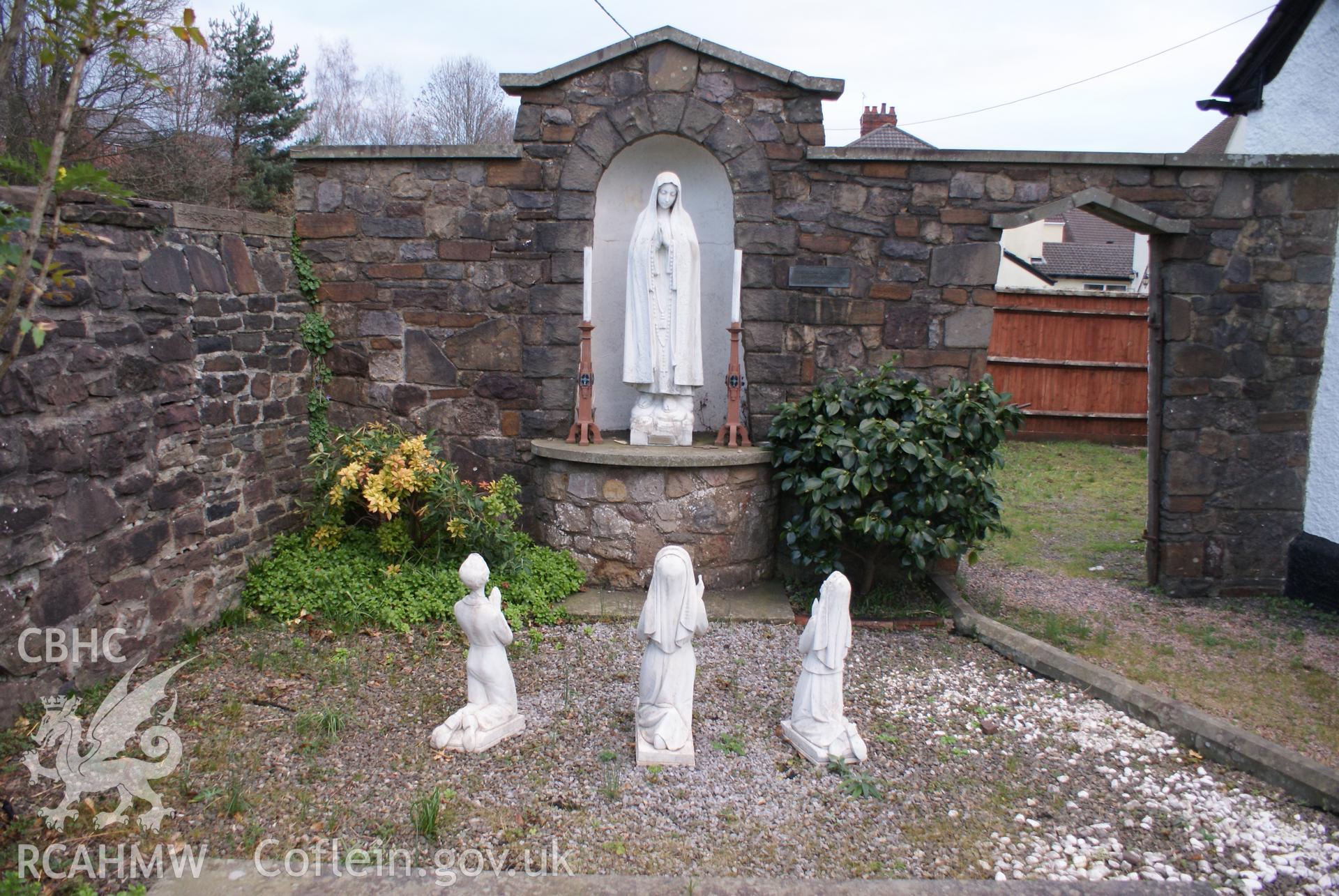 Digital colour photograph showing the Fatima grotto at St Anthony of Padua Catholic church, Risca.