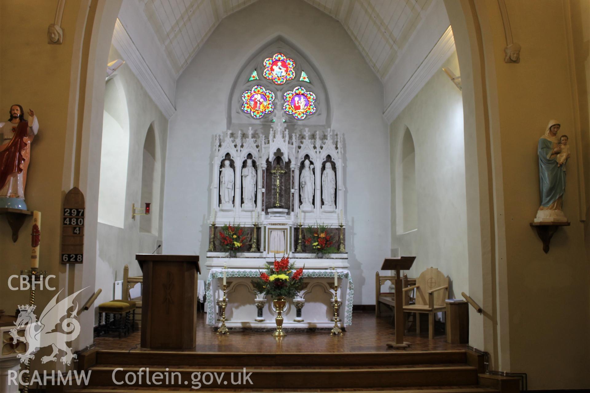 Digital colour photograph showing altar and reredos at St Mary's Catholic church, Carmarthen.