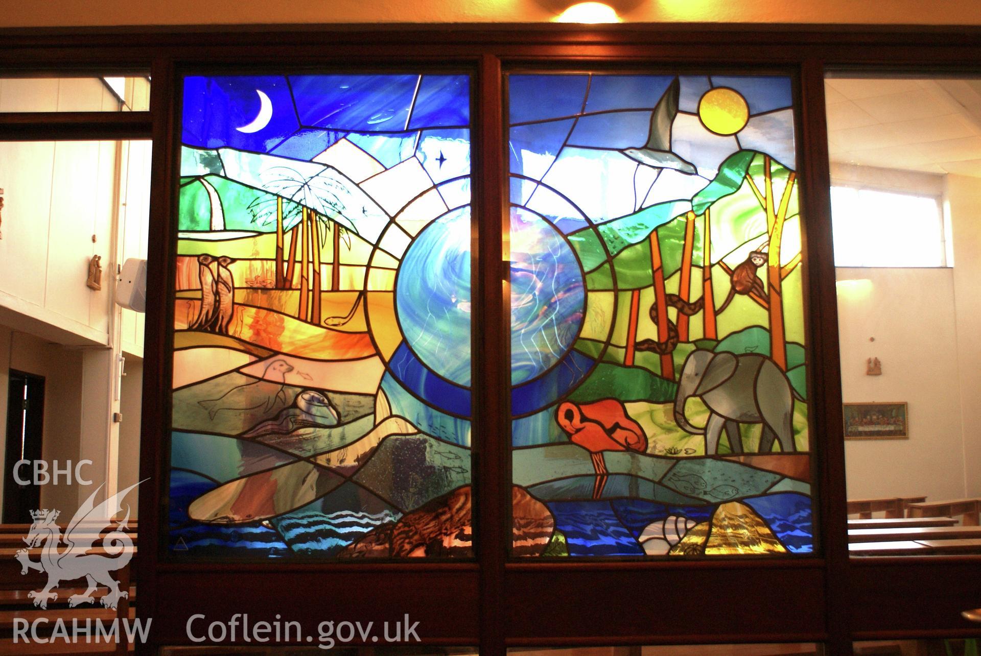 Digital colour photograph showing 'creation' glazed screen at St Therese of Lisieux Catholic church, Hirwaun.