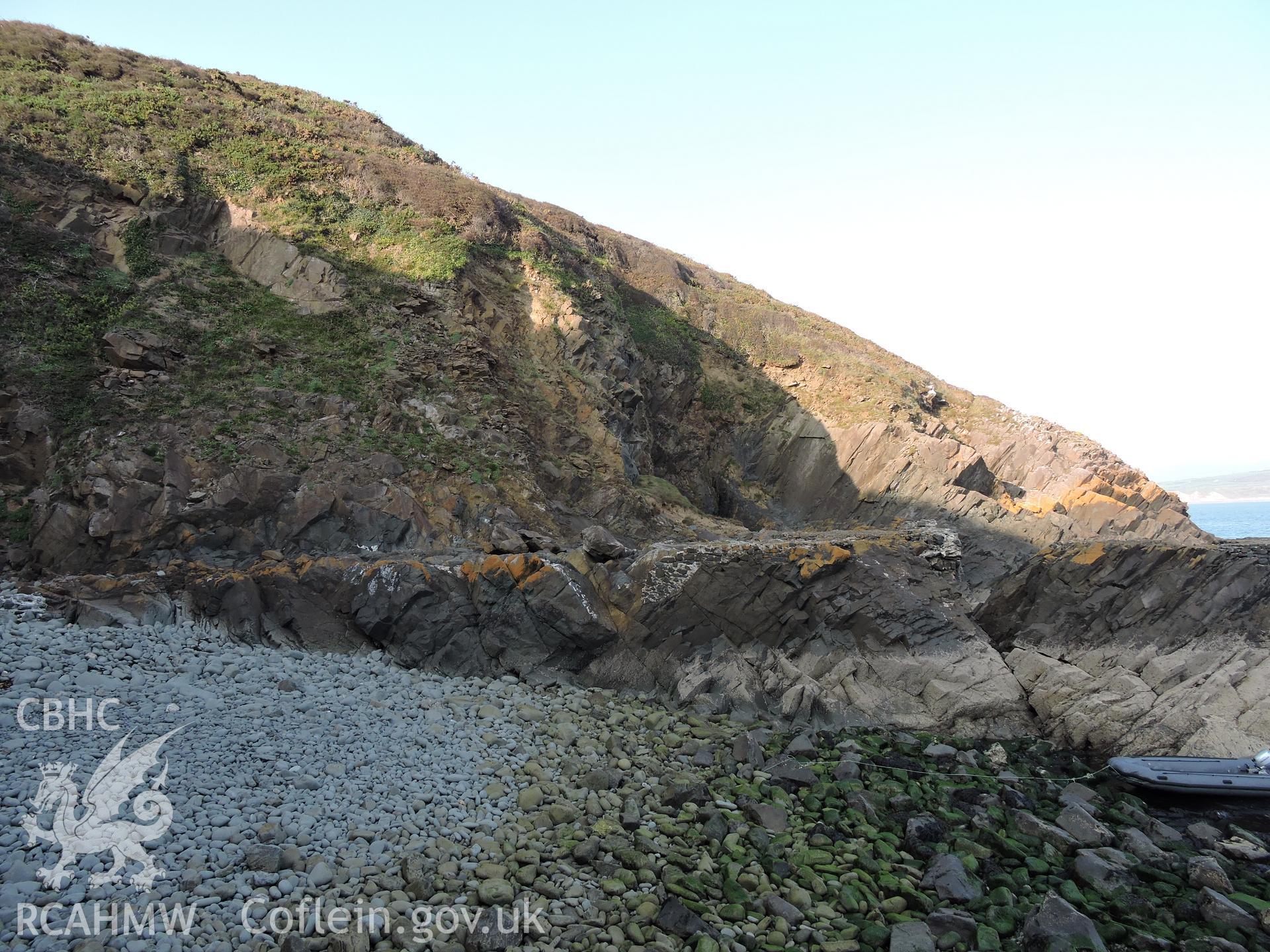General view of cliff next to the quay. Part of a digital photographic survey of Porth y Pistyll, Aberdaron, produced in 2020 by Michael Statham.