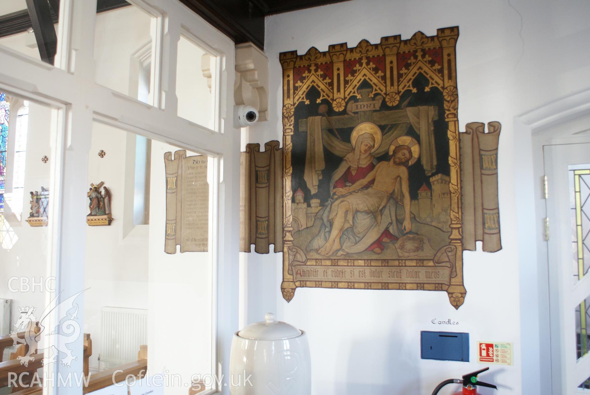 Digital colour photograph showing wall painting depicting the pieta in Our Lady and St Patrick's Catholic church, Maesteg.