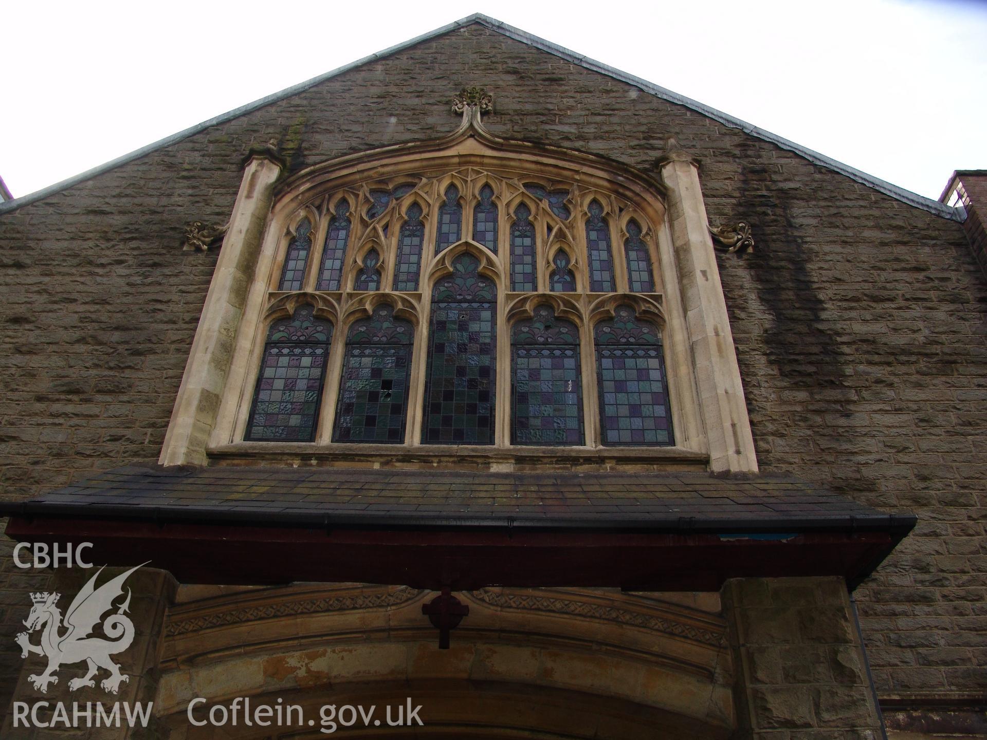 Photograph from a building recording survey: Zion Chapel, High Street, Newbridge, Gwent; external view of north elevation, stained glass window. Carried out by A. P. A. C. Ltd. in September 2008.