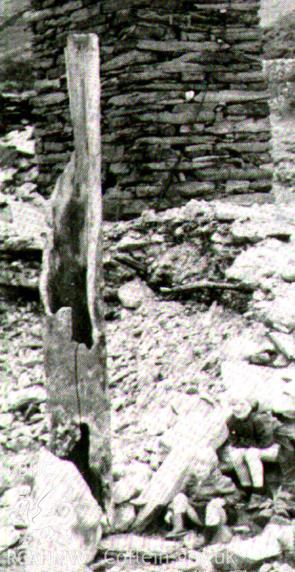 Digital image of remains of pipe sticking out of ground at Drws y Coed, Bick, 1982