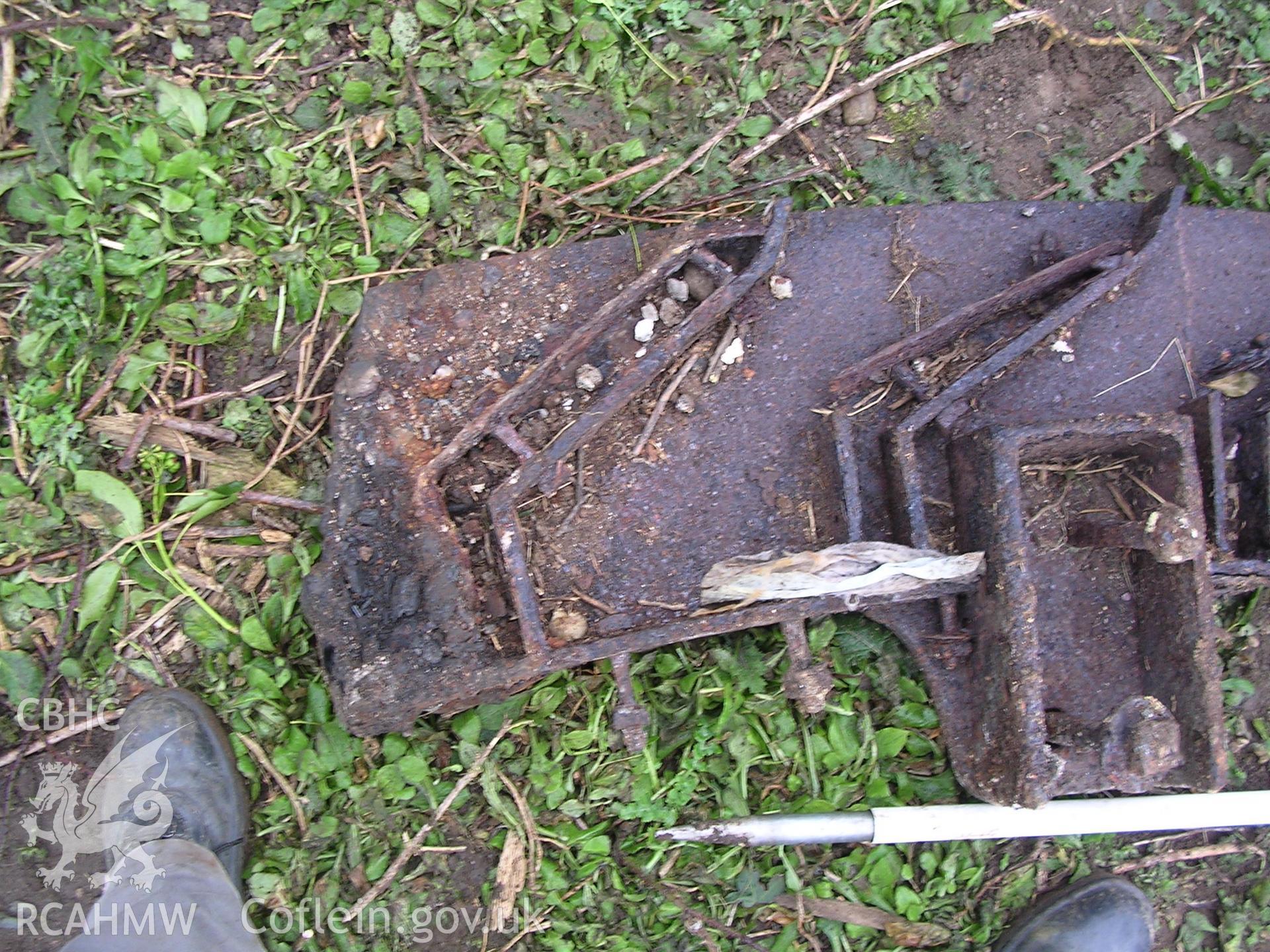 Digital photograph showing part of a waterwheel frame.