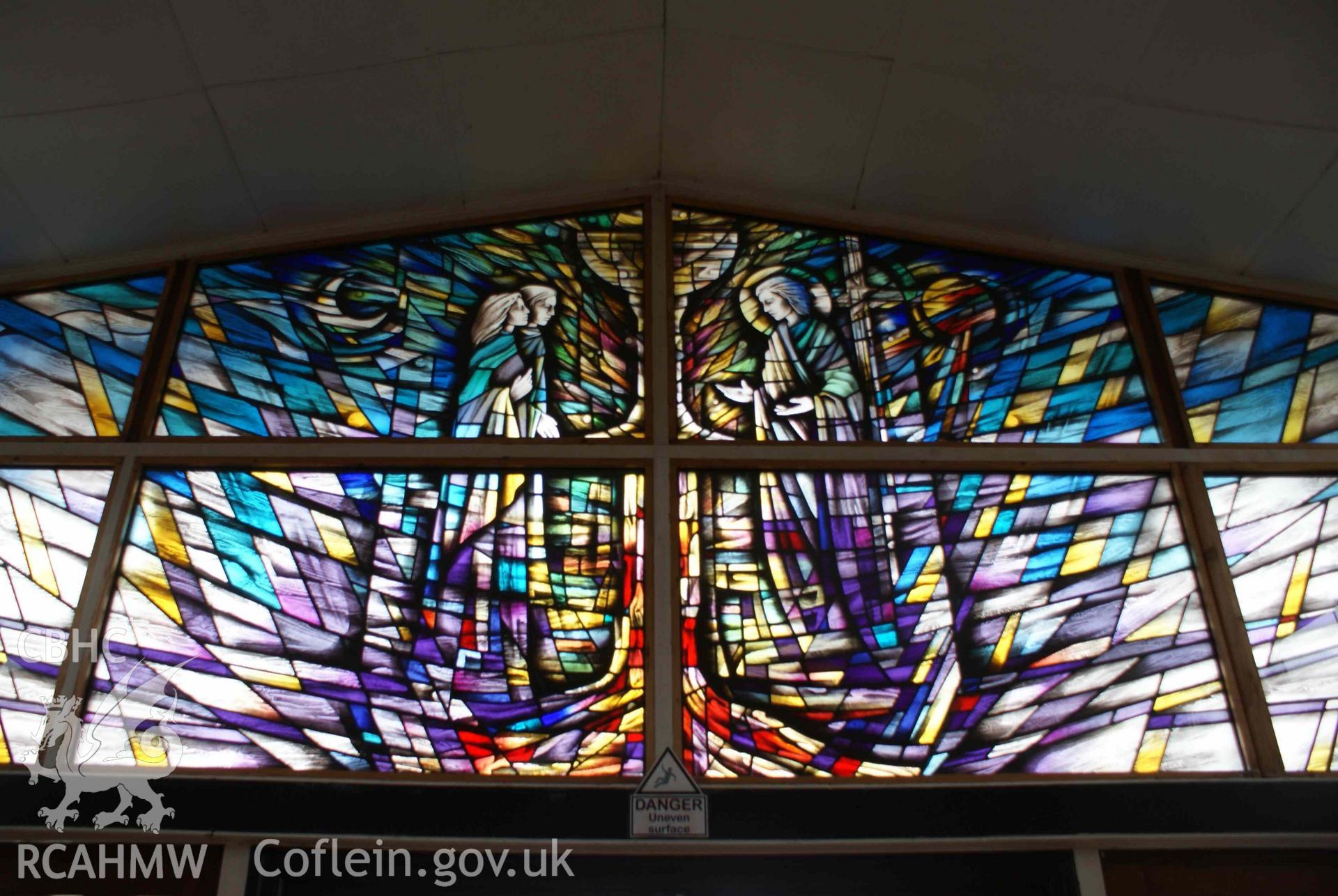 Digital colour photograph showing stained glass window by Alan Davis at St Mary Help of Christians Catholic church, Holyhead.