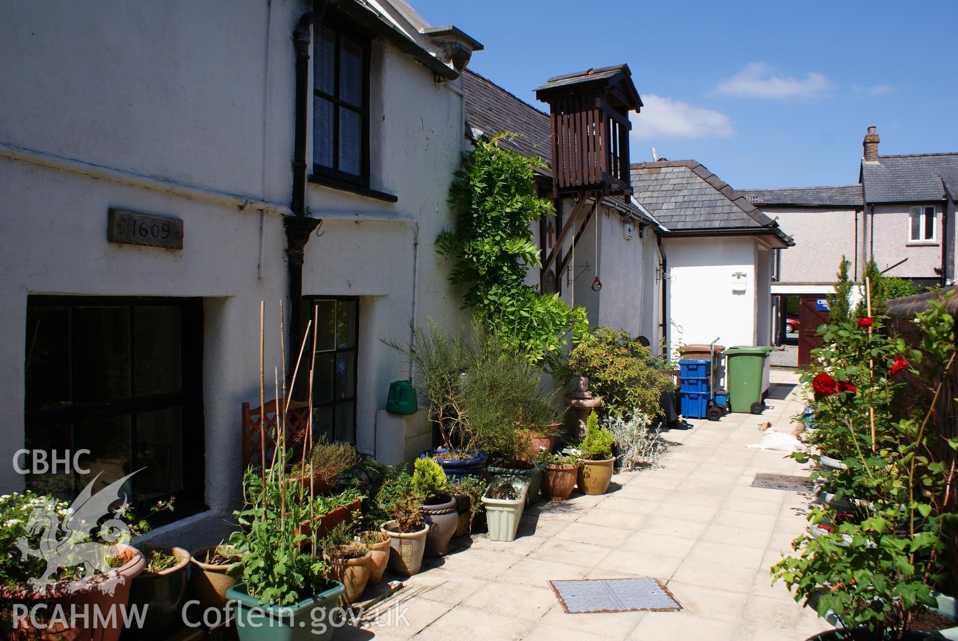 Digital colour photograph showing exterior of  Our Lady of Fatima Catholic church, Bala. (With plants in pots).