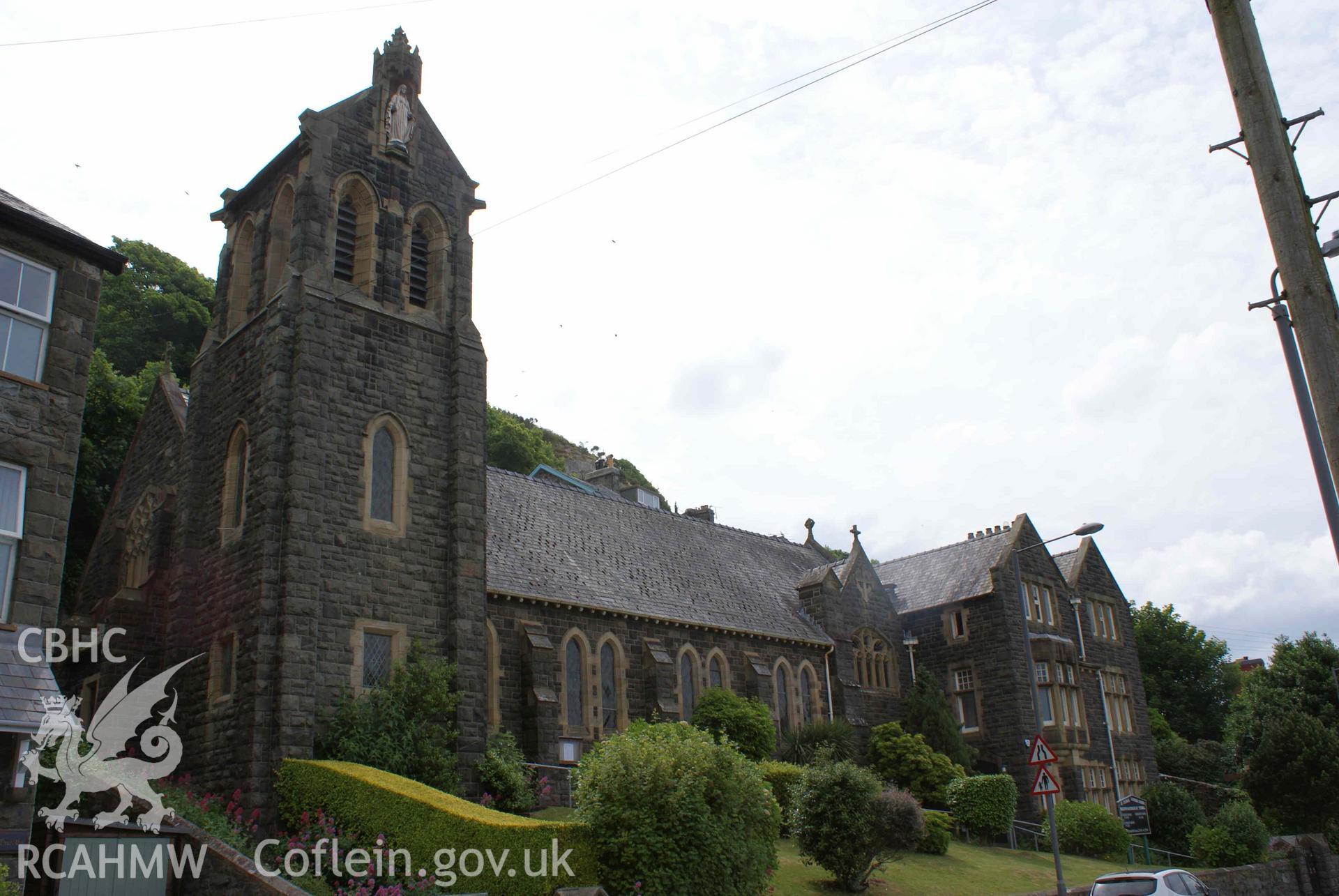 Digital colour photograph showing exterior and presbytery of St Tudwal's Catholic church, Barmouth.
