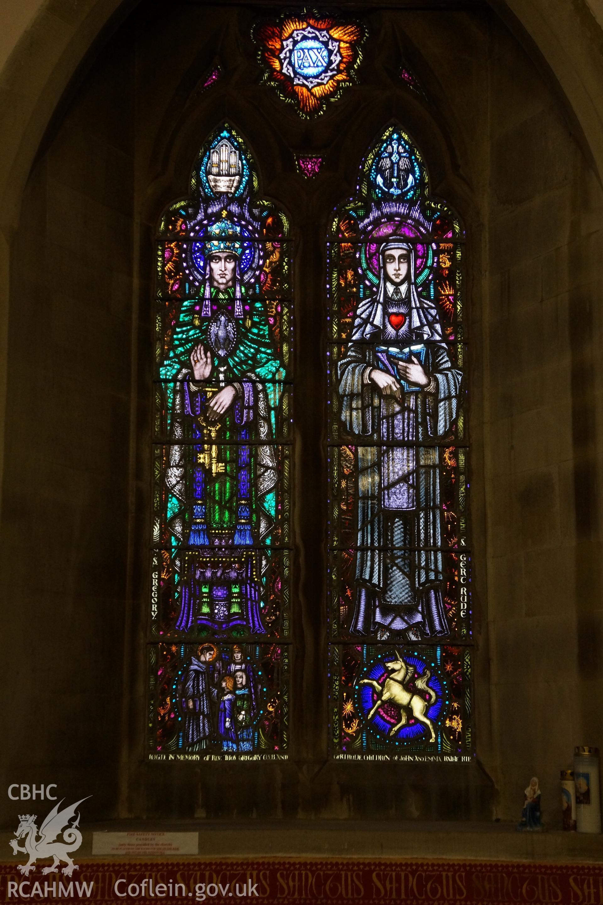 Digital colour photograph showing the Arts and Crafts stained glass windows in St David's Catholic church, Pantasaph.