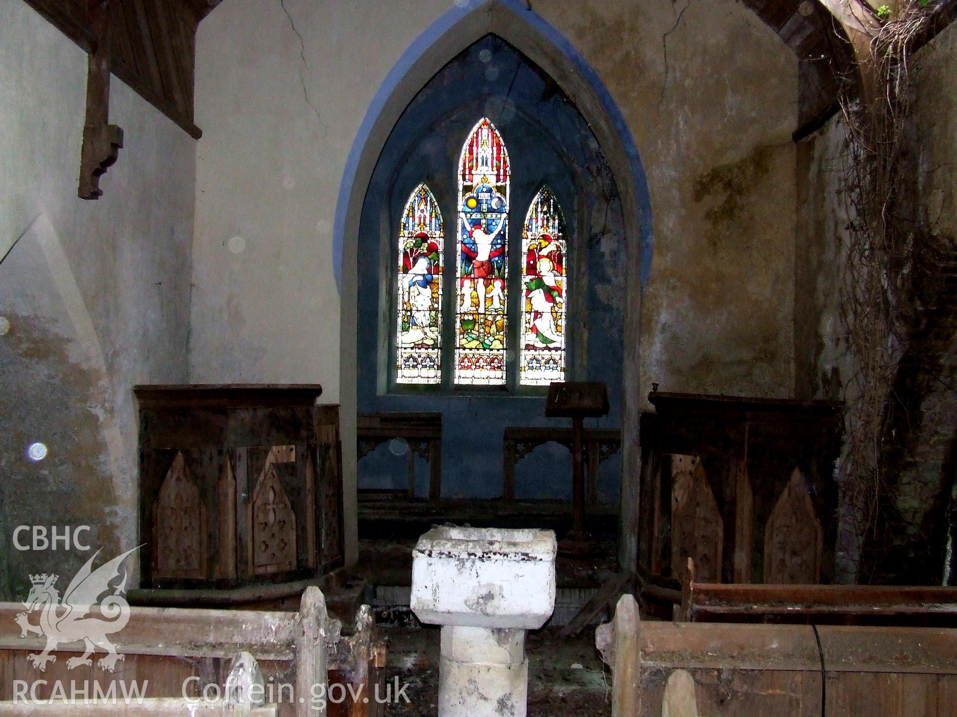 Digital colour photograph showing interior - nave looking east, Castell Dwyran church.