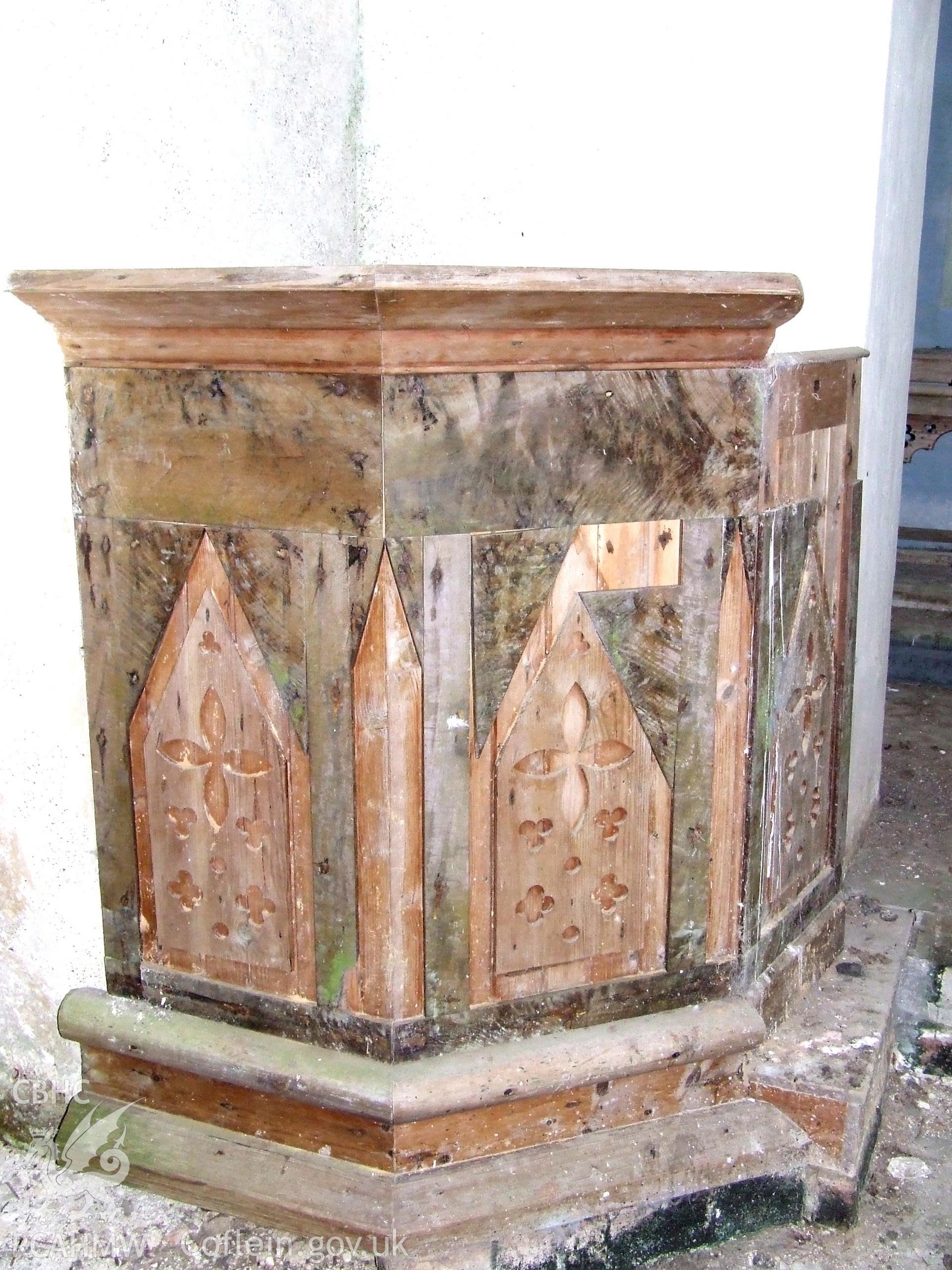 Digital colour photograph showing interior - pulpit, at Castell Dwyran church.