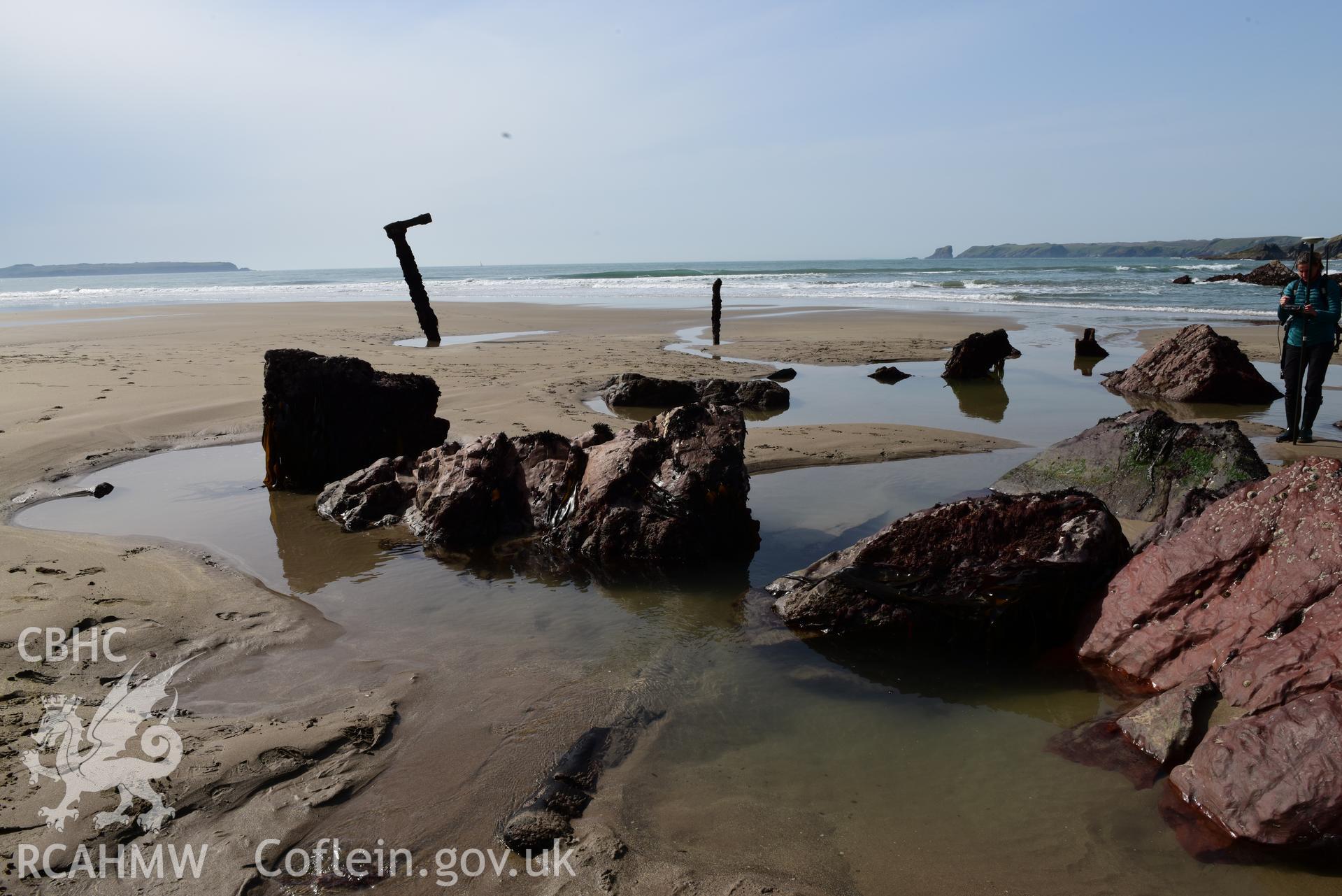General shot of beach with crank shaft fully visible. Taken by Toby Driver. Produced with EU funds through the Ireland Wales Co-operation Programme 2014-2023. All material made freely available through the Open Government Licence.