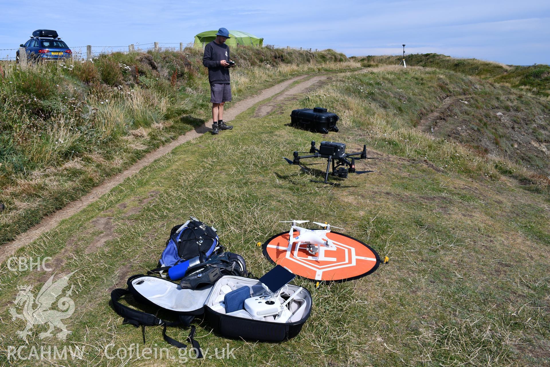 CHERISH team undertaking drone survey Taken by Daniel Hunt. Produced with EU funds through the Ireland Wales Co-operation Programme 2014-2023. All material made freely available through the Open Government Licence.
