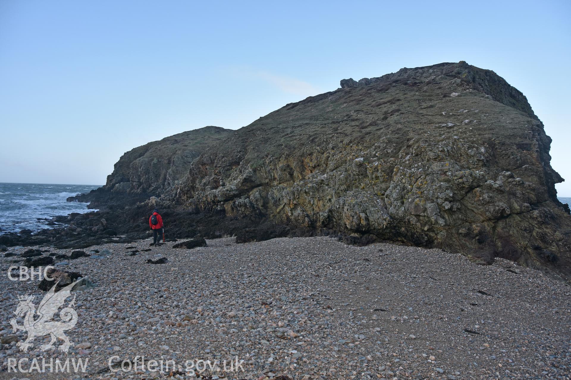 Ynys y Fydlyn Promontory Fort. Figure and 2m scale. Taken by Lou Barker. Produced with EU funds through the Ireland Wales Co-operation Programme 2014-2023. All material made freely available through the Open Government Licence.