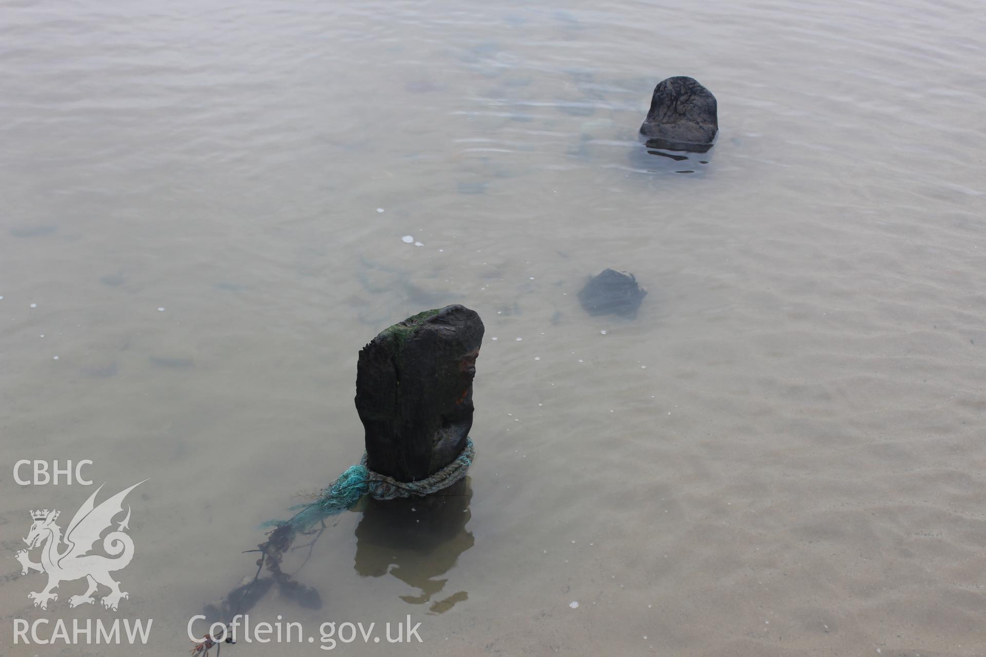 Close up of wreck at Morfa Dinlle. Photograph taken by Toby Driver in November 2017 as part of repeat monitoring and survey by the CHERISH project. © Crown: CHERISH PROJECT 2017. Produced with EU funds through the Ireland Wales Co-operation Programme 2014-2023. All material made freely available through the Open Government Licence.