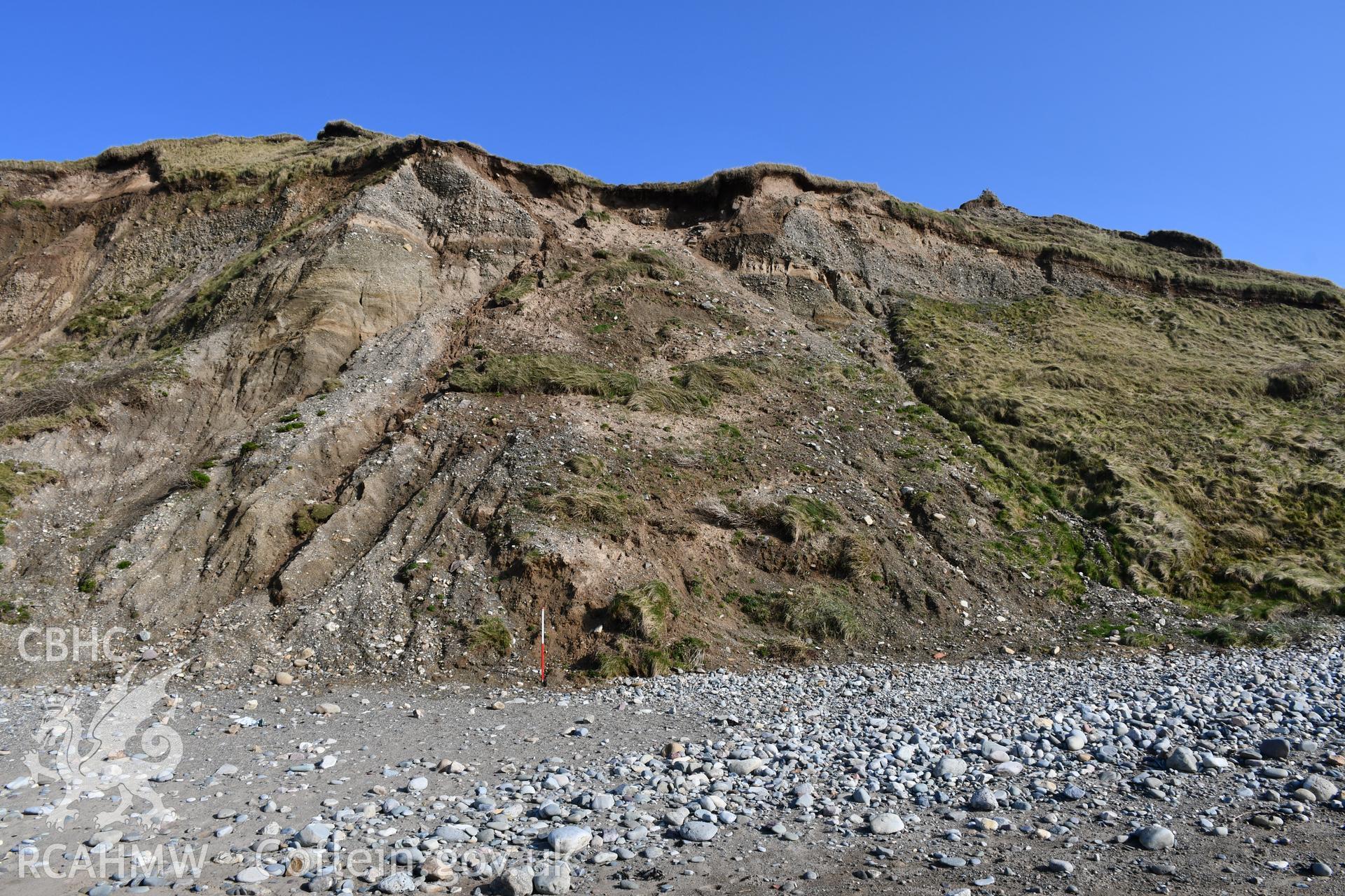 Area where sediments have moved significantly, along with covering turf. 2m scale. Taken by Toby Driver. Produced with EU funds through the Ireland Wales Co-operation Programme 2014-2023. All material made freely available through the Open Government Lice