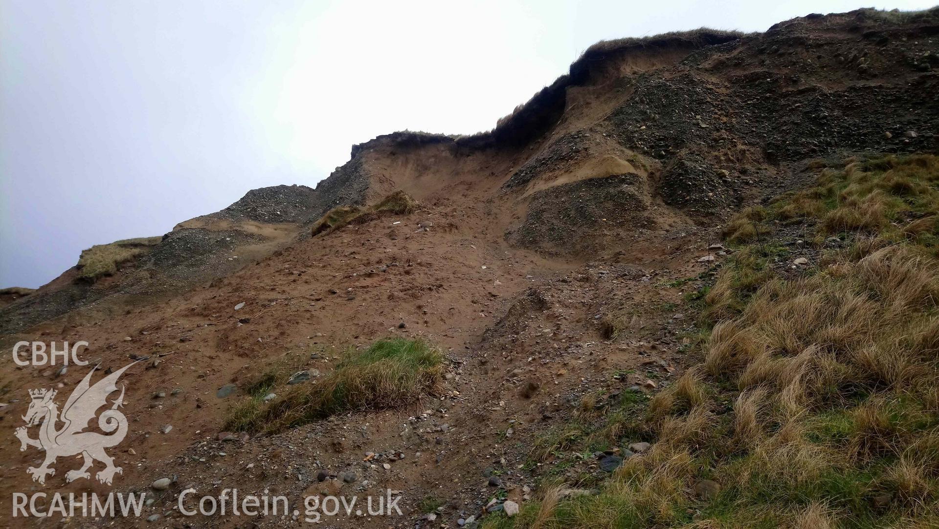 Eroding cliff face. Camera facing NE. Taken by Toby Driver. Produced with EU funds through the Ireland Wales Co-operation Programme 2014-2023. All material made freely available through the Open Government Licence.