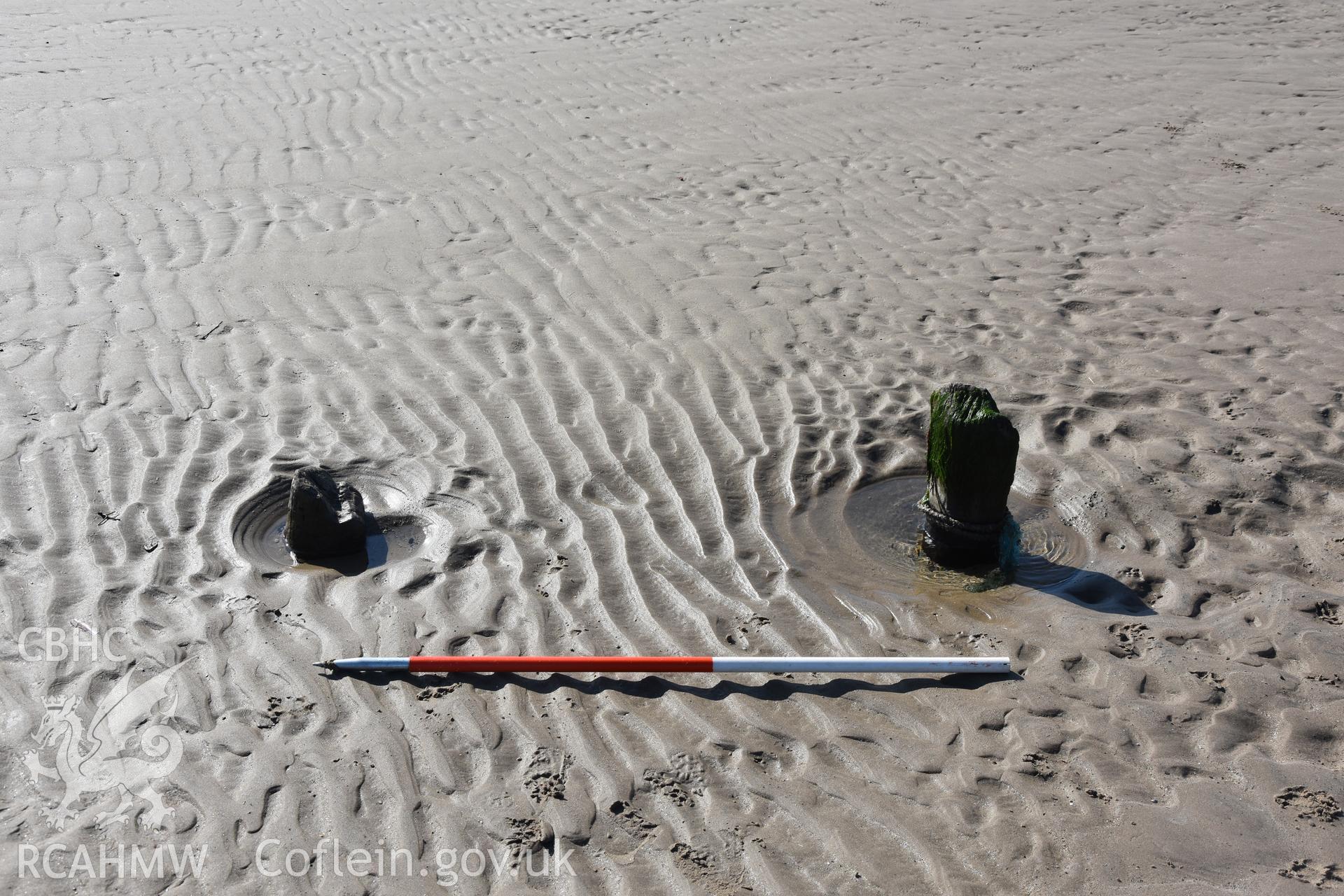 Shot of part of a wreck with 2m scale. Photograph taken by Toby Driver in March 2019 as part of repeat monitoring and survey by the CHERISH project. © Crown: CHERISH PROJECT 2019. Produced with EU funds through the Ireland Wales Co-operation Programme 2014-2023. All material made freely available through the Open Government Licence.